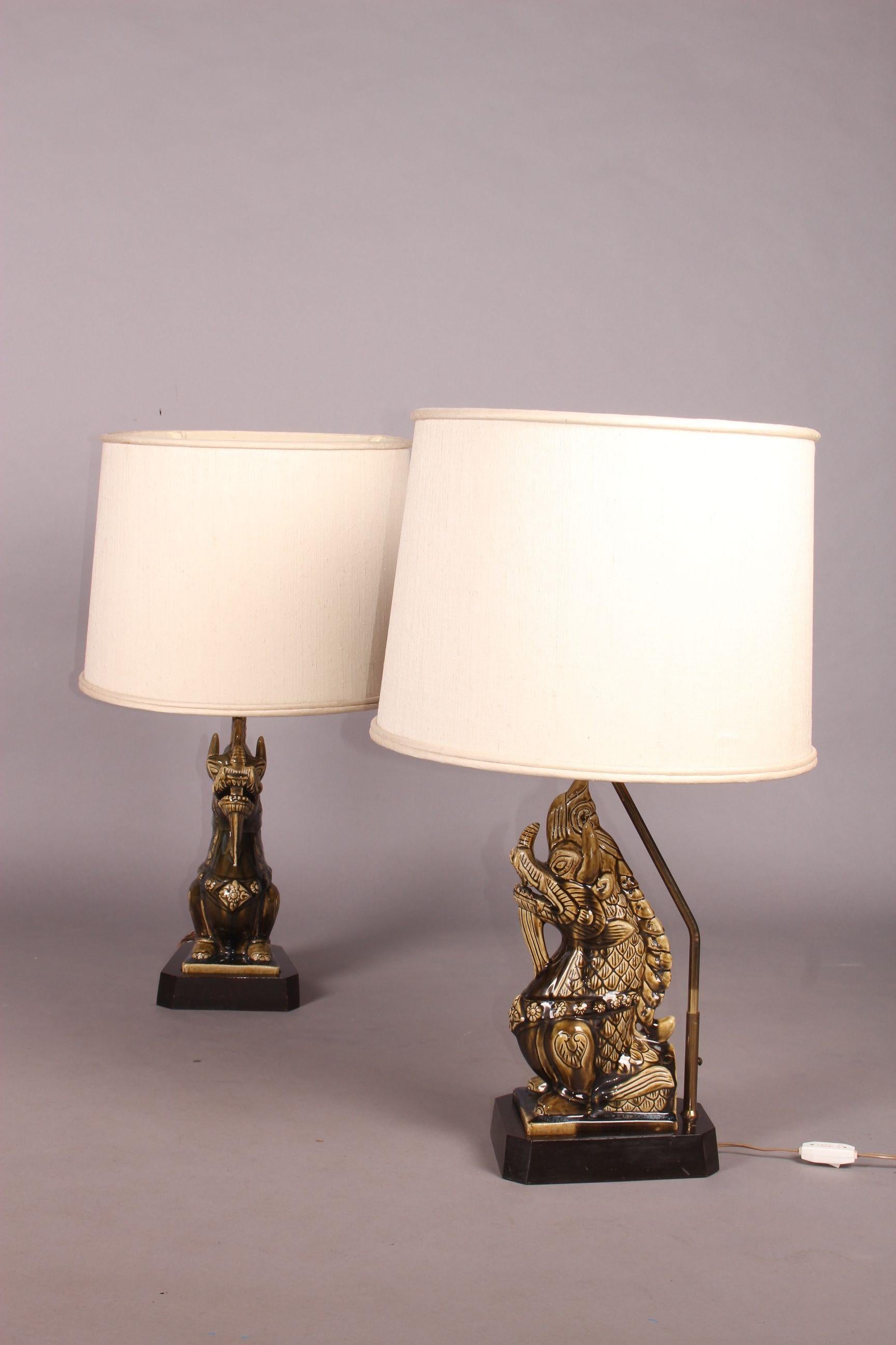 Ceramic pair of table lamp, one shade must be change.