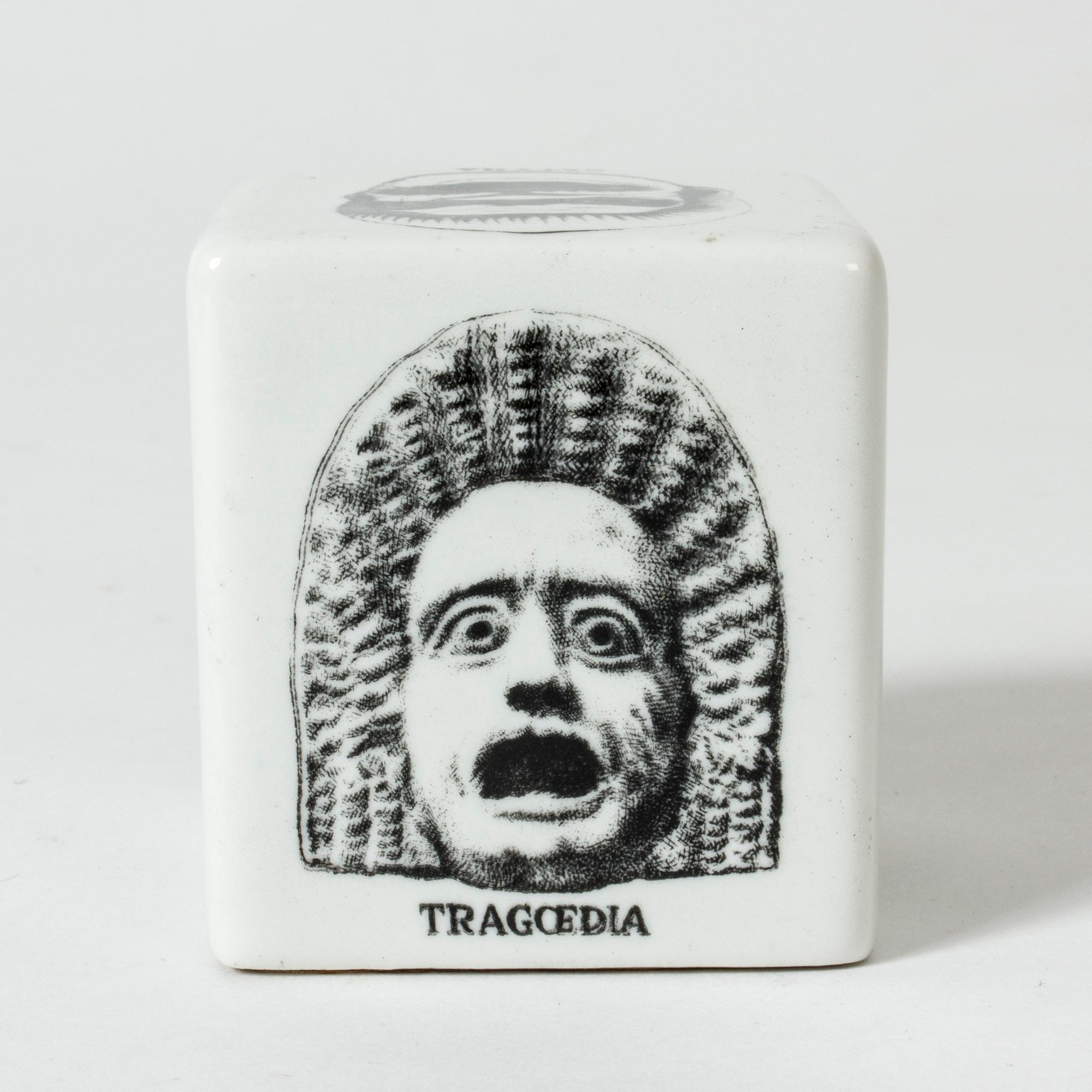 Expressive ceramic paper weight by Piero Fornasetti. Decor on each side of theatre masks representing different genres.