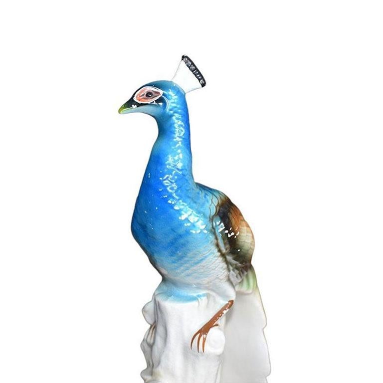 ceramic peacock figurine