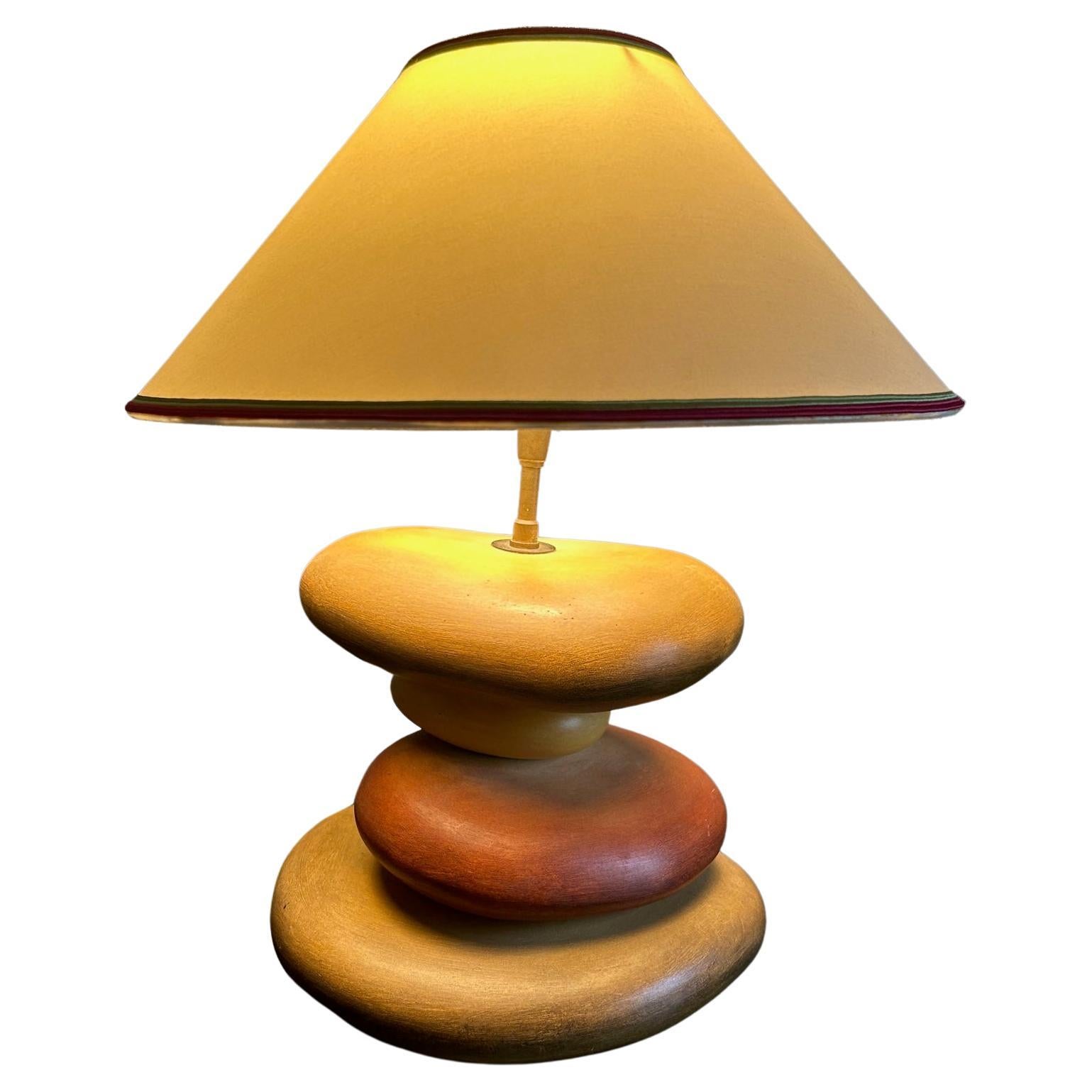 Unusual warm shades for this gorgeous ceramic lamp designed by François Châtain in the 1980's, France.