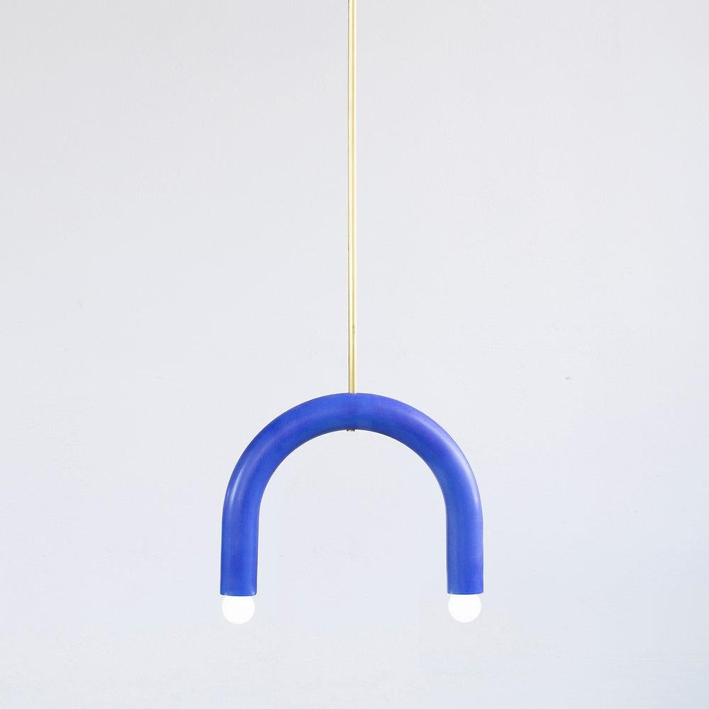 TRN B1 Pendant lamp / ceiling lamp / chandelier 
Designer: Pani Jurek

Dimensions: H 27.5 x 35 x 5 cm
Model shown: Cobalt blue

Bulb (not included): E27/E26, compatible with US electric system

Materials: Hand glazed ceramic and brass
Rod: brass,