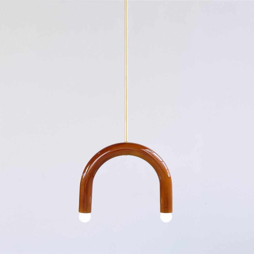 TRN B1 Pendant lamp / ceiling lamp / chandelier 
Designer: Pani Jurek

Dimensions: H 27.5 x 35 x 5 cm
Model shown: Ochre

Bulb (not included): E27/E26, compatible with US electric system

Materials: Hand glazed ceramic and brass
Rod: brass, length