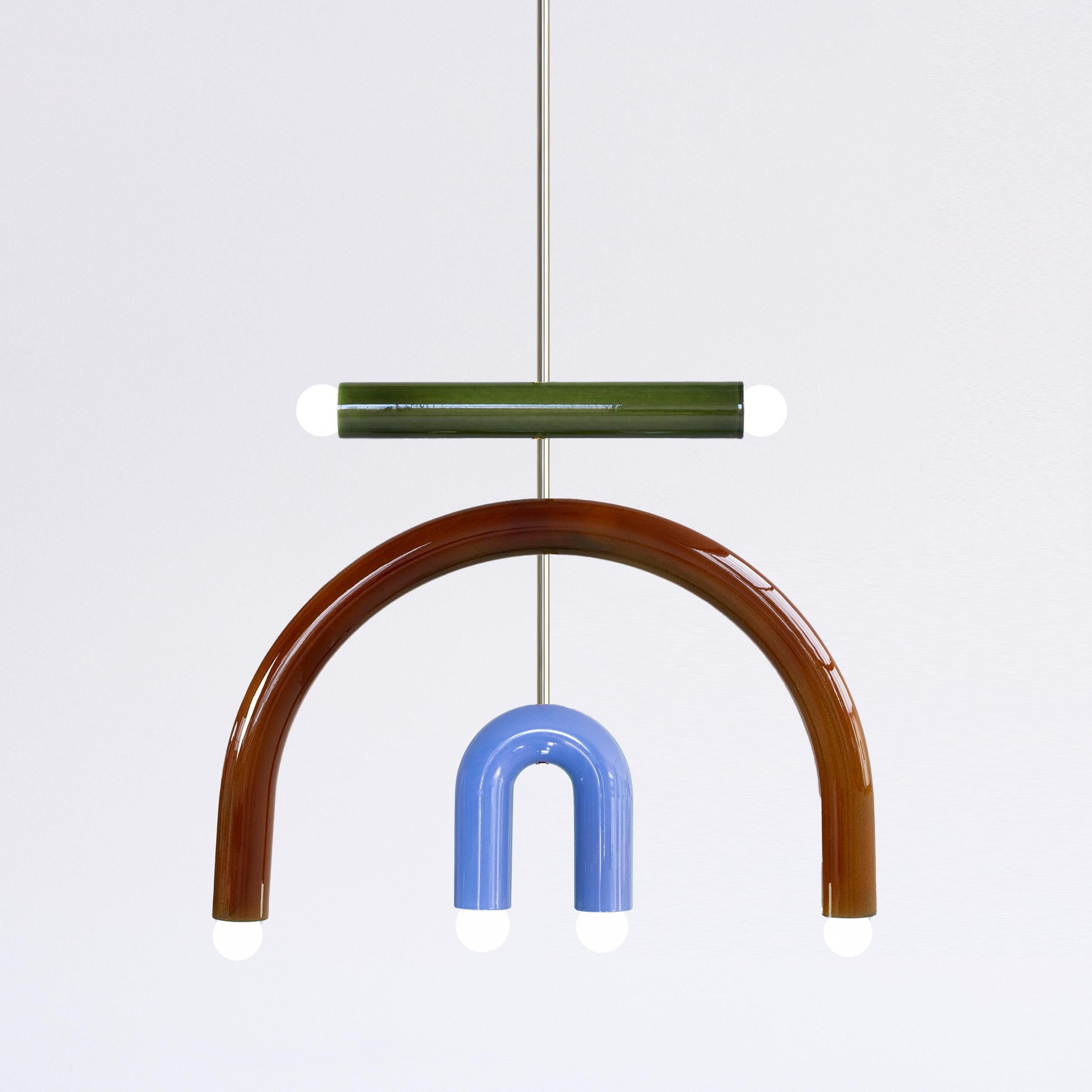 The F3 lighting pendant is part of TRN collection. 

Three dimensional objects inspired by Jan Tarasin painting, have simple calligraphic forms which can play together as if they were letters from a non-existent alphabet. 
The hand crafted process