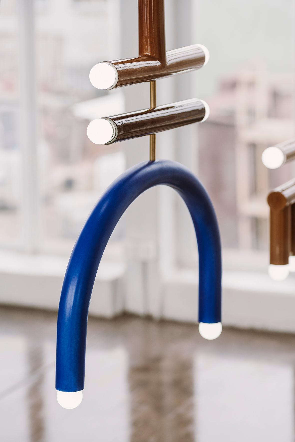 TRN F3 Pendant lamp / ceiling lamp / chandelier 
Designer: Pani Jurek

Model shown: TRN F3, Pink, Cobalt blue, Pistachio, Brass rod
Dimensions: H 48 x 55 x 5 cm
Bulb (not included): E27/E26, compatible with US electric system

- Green -
- Big arc