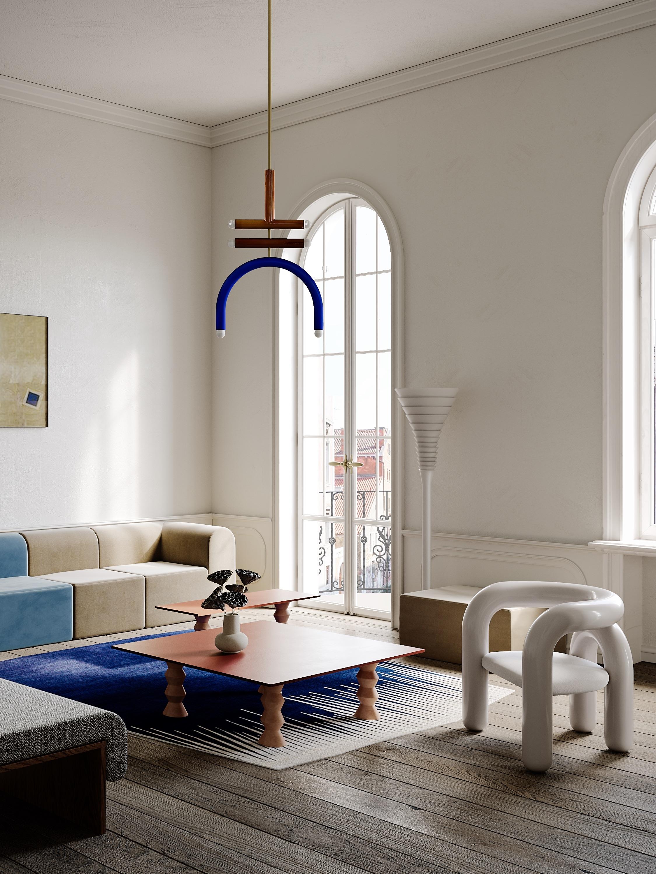 The F2 lighting pendant is part of TRN collection. 

Three dimensional objects inspired by Jan Tarasin painting, have simple calligraphic forms which can play together as if they were letters from a non-existent alphabet. 
The hand crafted process