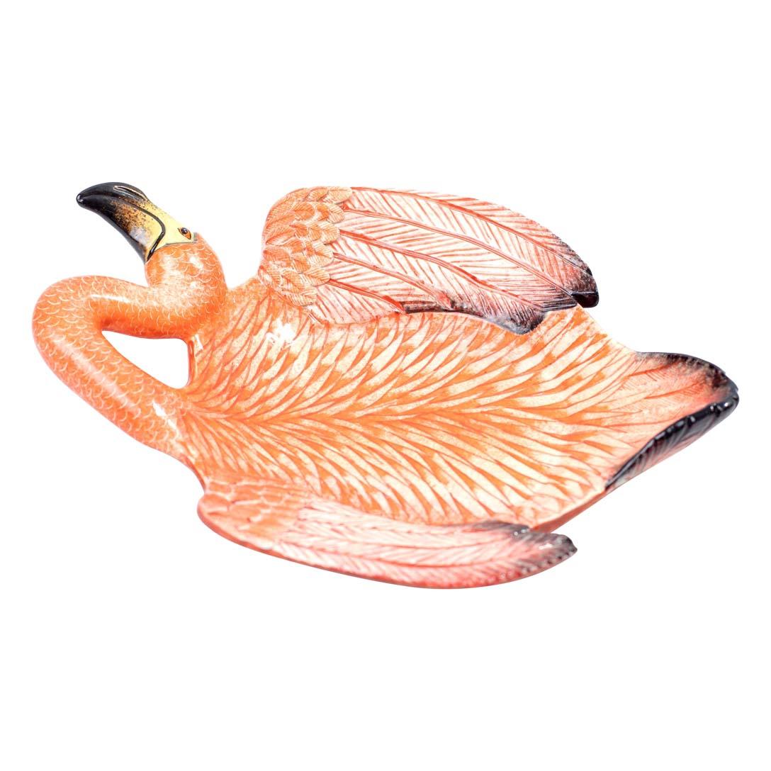 Celebrate the elegance and vibrant spirit of the African flamingo with this hand-sculpted Flamingo Coin Dish from Love Art Ceramics. A true one-of-a-kind piece, this dish was skillfully shaped by Nathi and exquisitely hand-painted by Nozipho—two