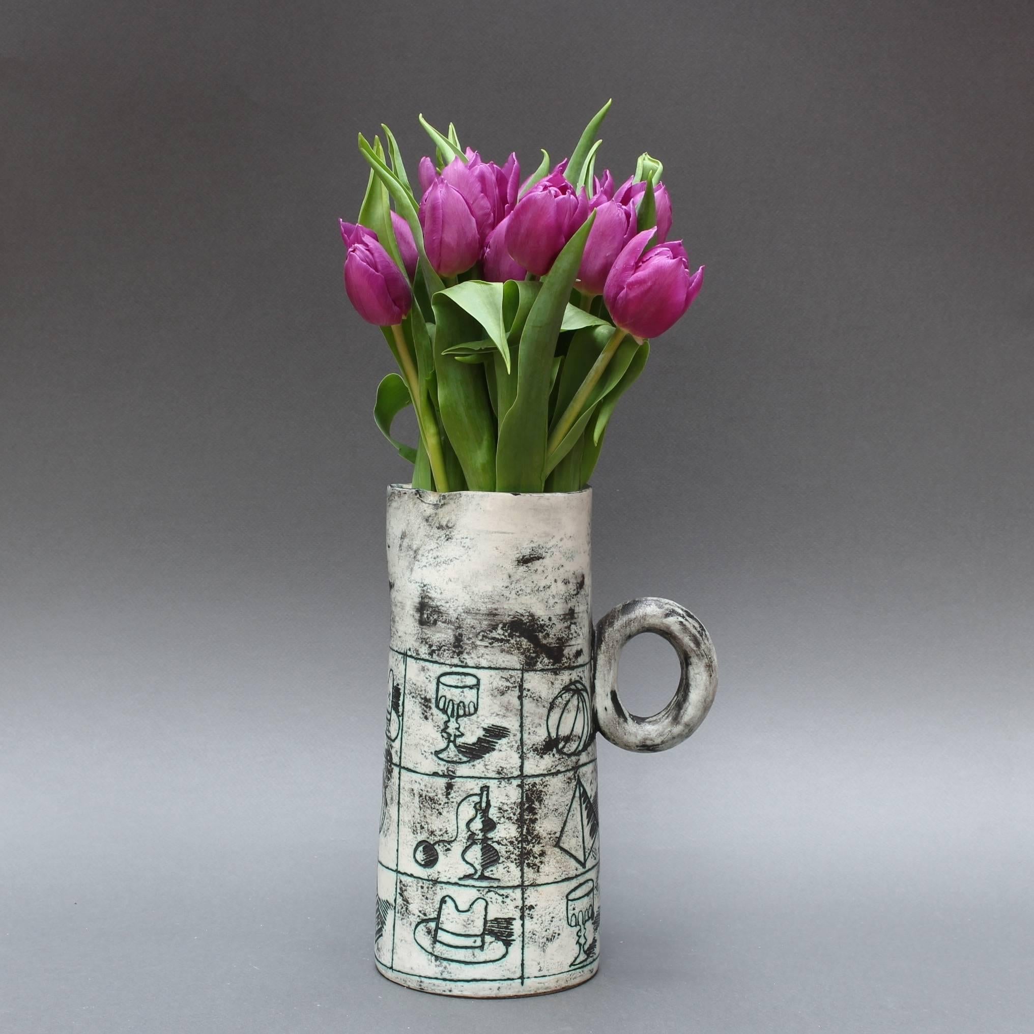 Ceramic pitcher (c. 1950s) by Jacques Blin (1920 - 1995), an engineer by trade but with a love for the visual arts and an immediately recognisable style. A way of working characterised by a more or less misty appearance of the glaze and by