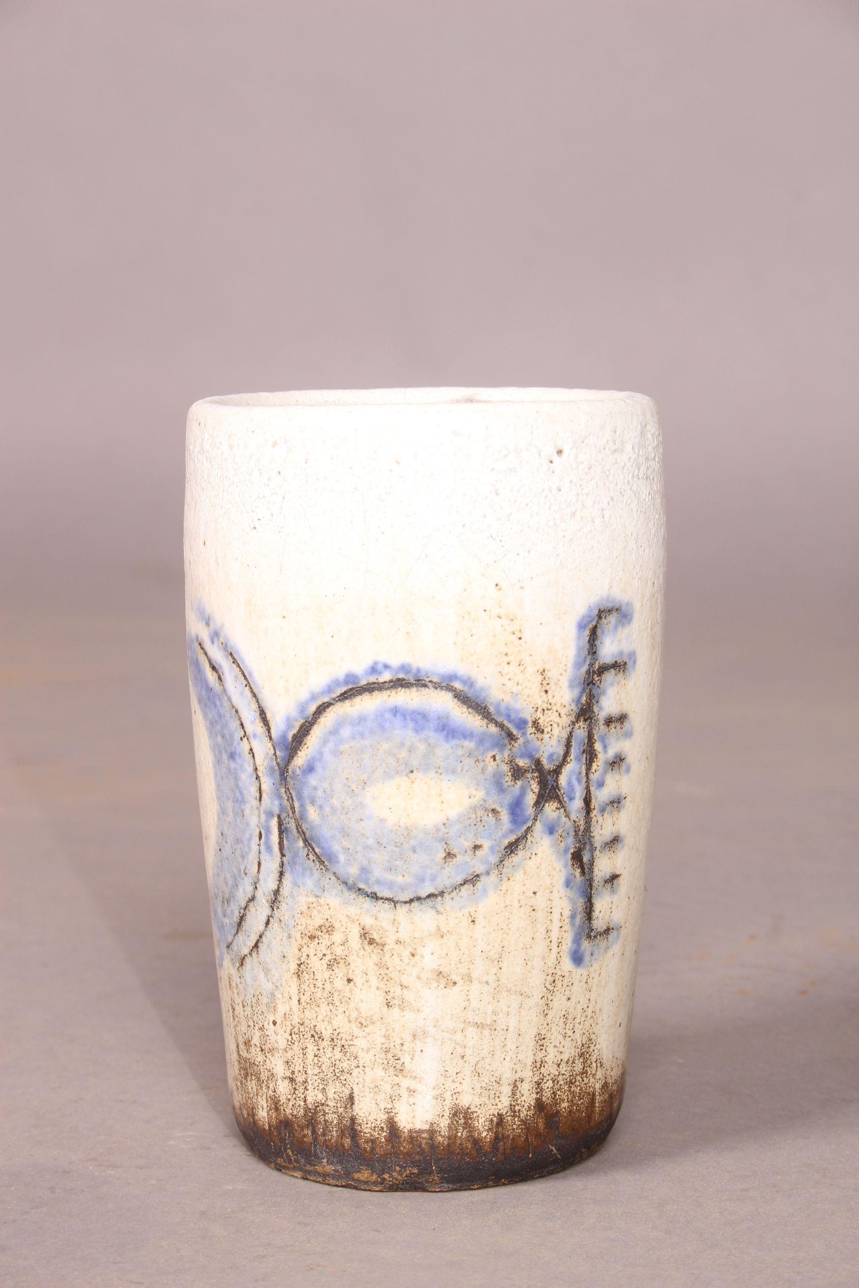 Ceramic pitcher.