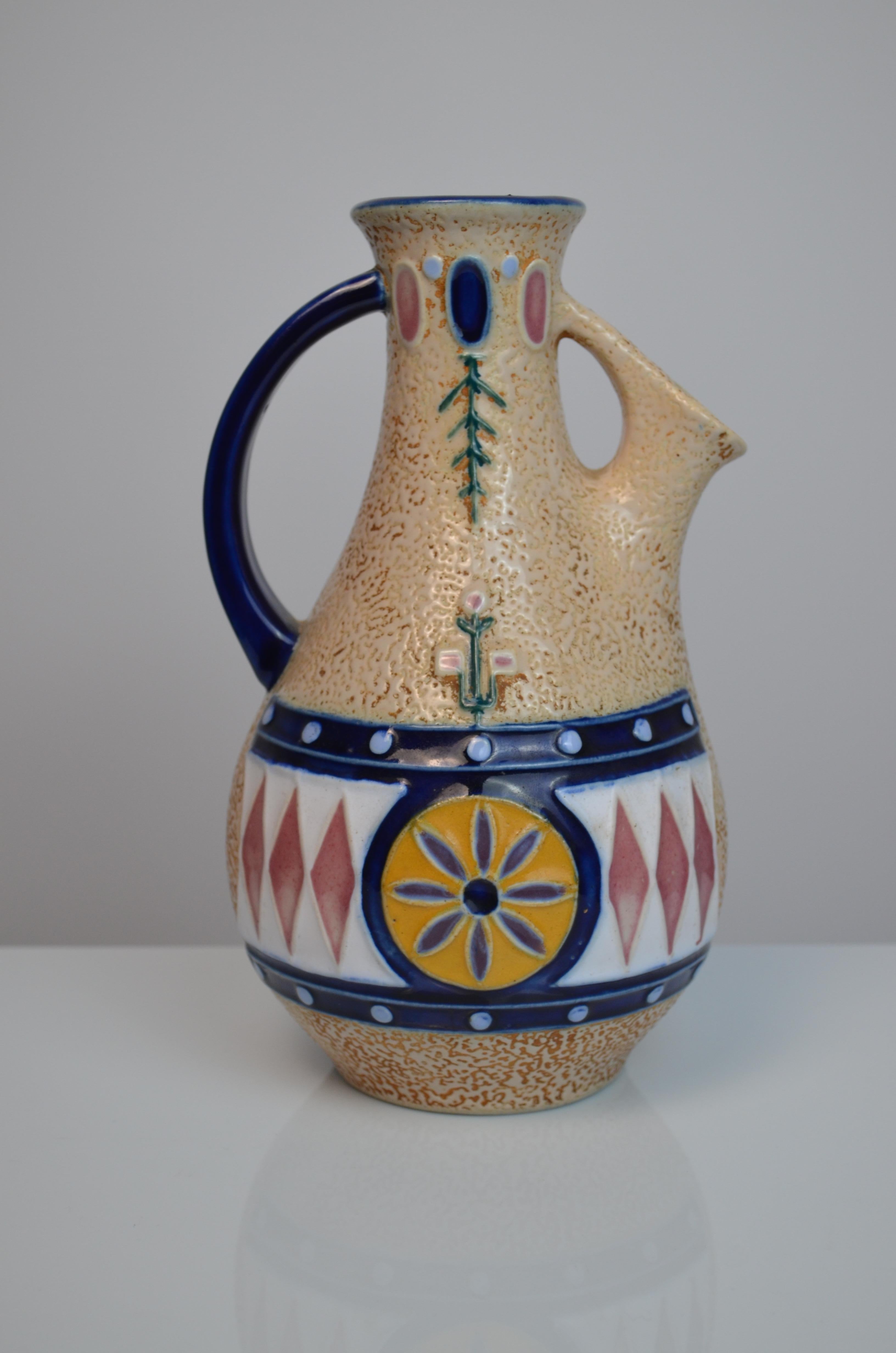 Czechoslovakian glazed ceramic pitcher by the Amphora manufacturer, 1920s-1930s
Art Deco style.
Amazing condition and design in relation to its age.
Signed under the base.