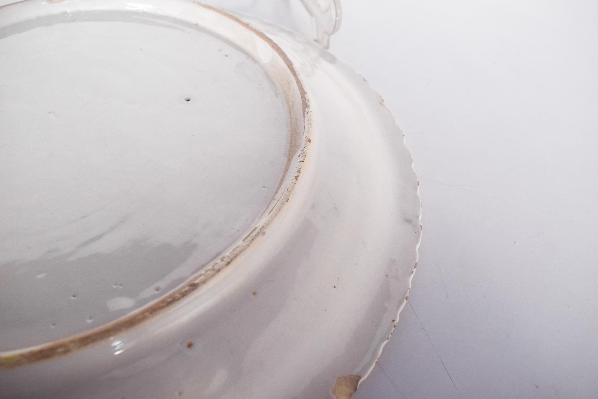 Céramique Assiette en céramique, décorée en bleu sur blanc en vente