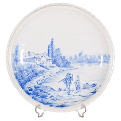Assiette en céramique, décorée en bleu sur blanc