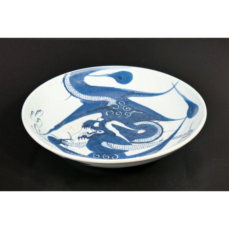 Ceramic plate painted in blue on light blue with the dragon motif. 
Ming dynasty, 1630-1640

Origin: China
Period: Ming Dynasty 1630-1640
Materials: Ceramic painted in blue on light blue
Dimensions: Ø 25.7 cm 
Conditions: The plate is in very