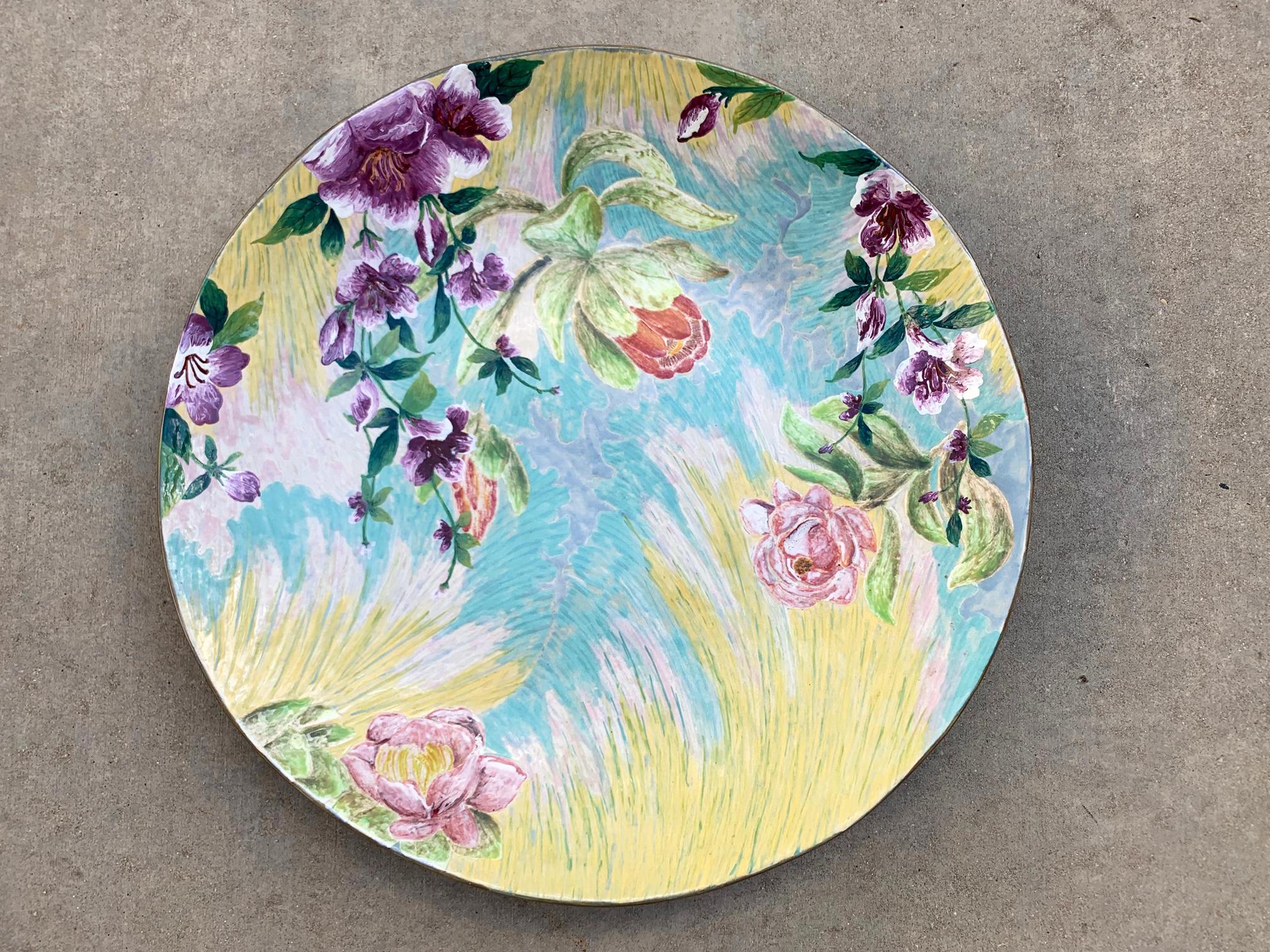 Newly-made ceramic plate with colorful hand painted floral designs. Made in Thailand.
 