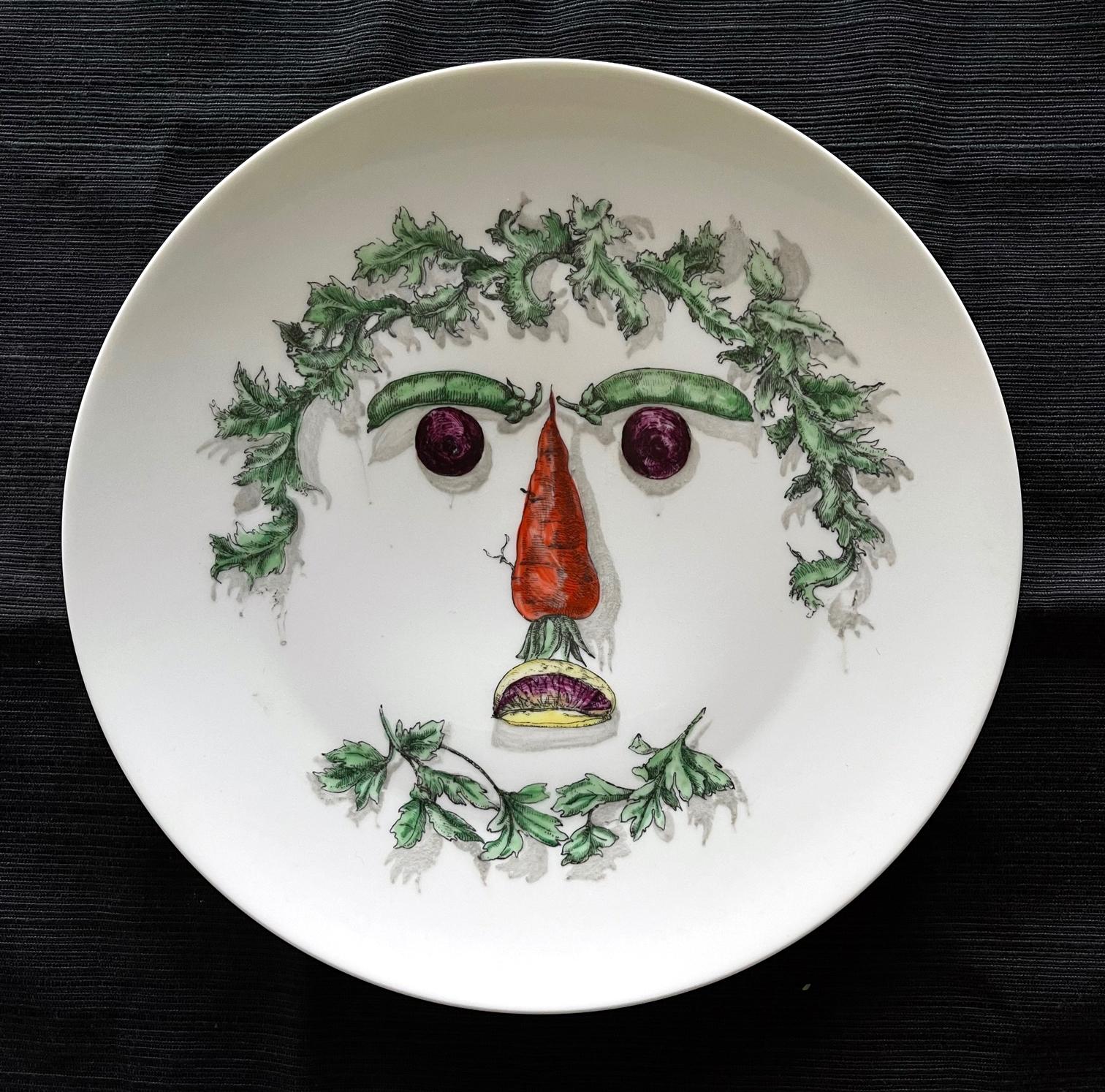 Fornasetti Porcelain Plate with face made with arranged vegetables. Stamped 