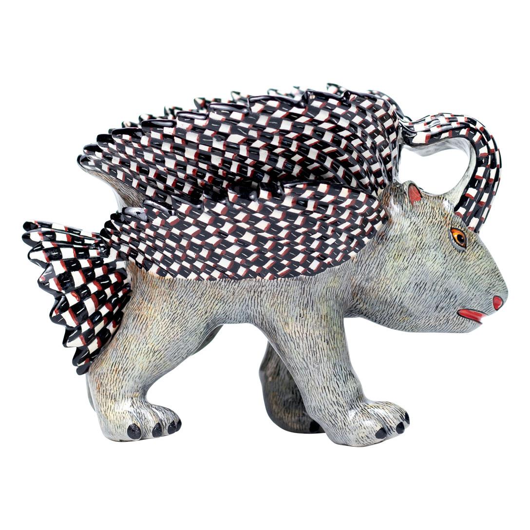Porcupine Peanut Bowl
Hand Painted by Jabu Nene, Sculpted by Sbusiso Ndaba
Love Art Ceramic, South Africa

The Porcupine Peanut Bowl is a stunning piece of decorative art that embodies the rich biodiversity of South Africa. Measuring 5 inches high,