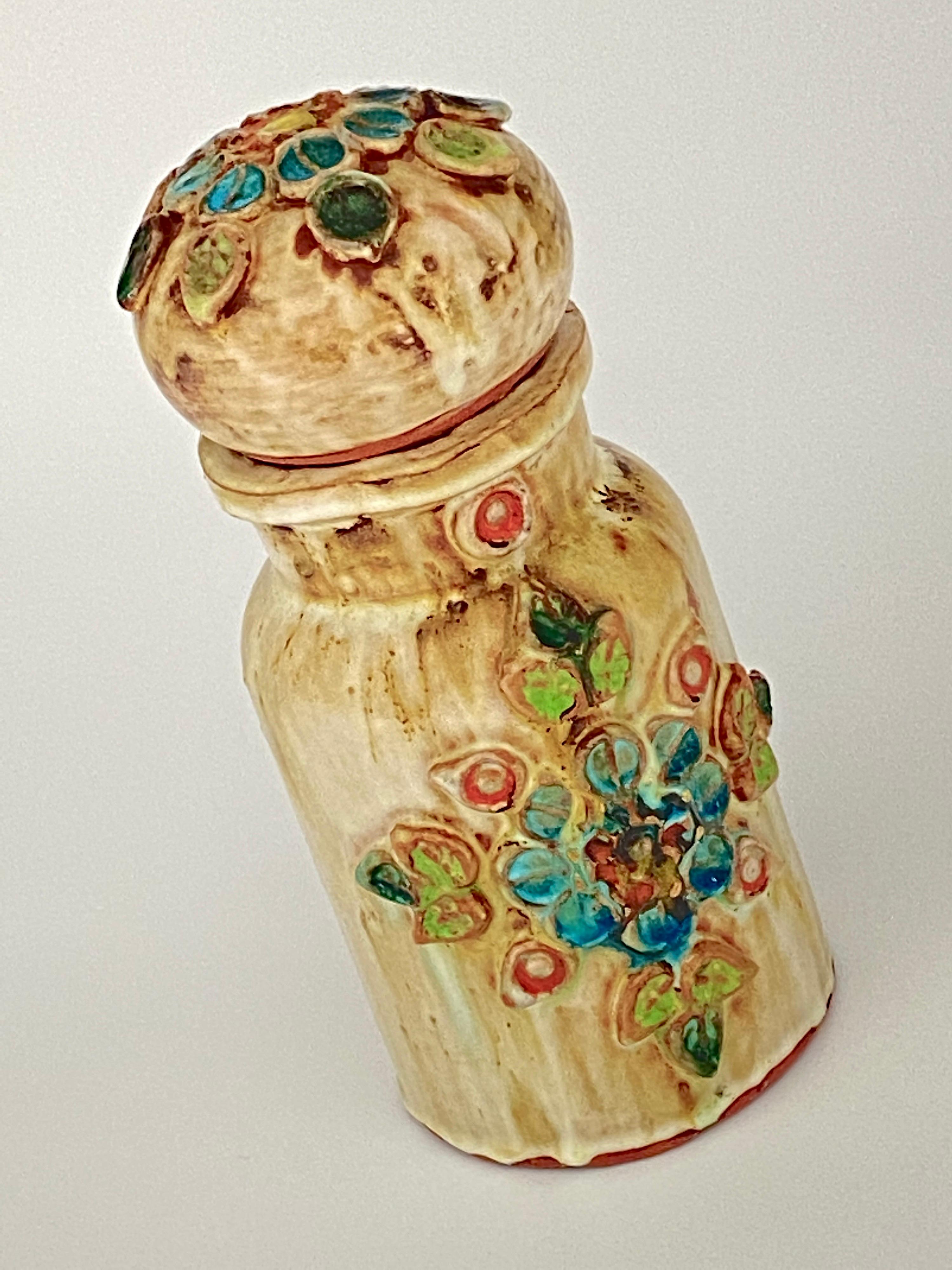 This Ceramic pot is in Ceramic. The decorative Patterns are flowers in ceramic. It has been done in South of France, circa 1970.