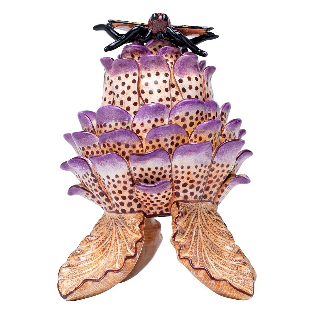 Protea, Butterfly Jewelry Box Hand Painted by Jabu Nene and Sculpted by Sbusiso Ndaba from Love Art Ceramic

This enchanting Protea, Butterfly Jewelry Box is a testament to the vibrant artistry of South Africa, expertly crafted in 2024 by the