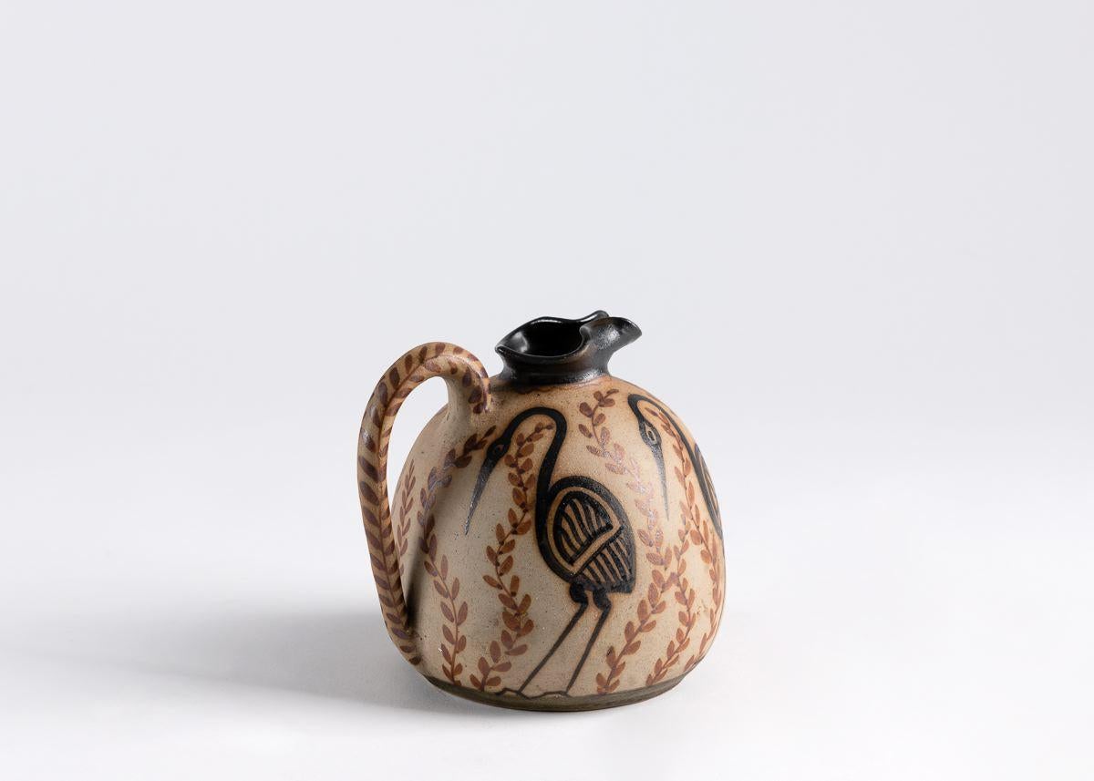 One of a set of beautiful ceramics from Ciboure pottery, this piece is inspired by antiquity, evident in its form (that of a vessel), its spare coloring, and its depiction of game. Executed by Etienne Vilotte, one of the
founders of the Ciboure