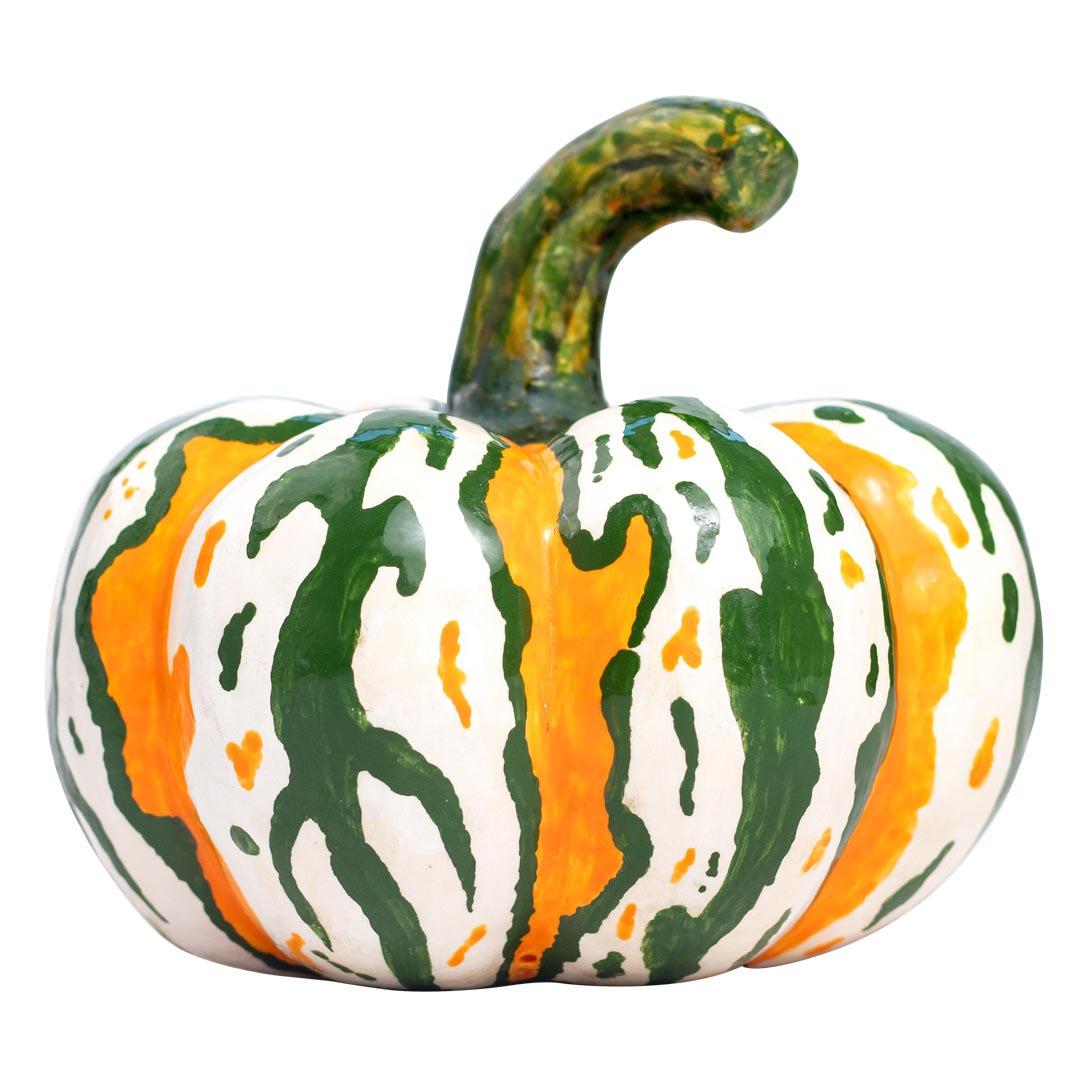 This lovely ceramic pumpkin is a perfect addition  With its intricate details and vibrant colors of green, white, and orange, it beautifully captures the spirit of the season. Standing at 5 inches tall and 6 inches wide, this unique piece showcases