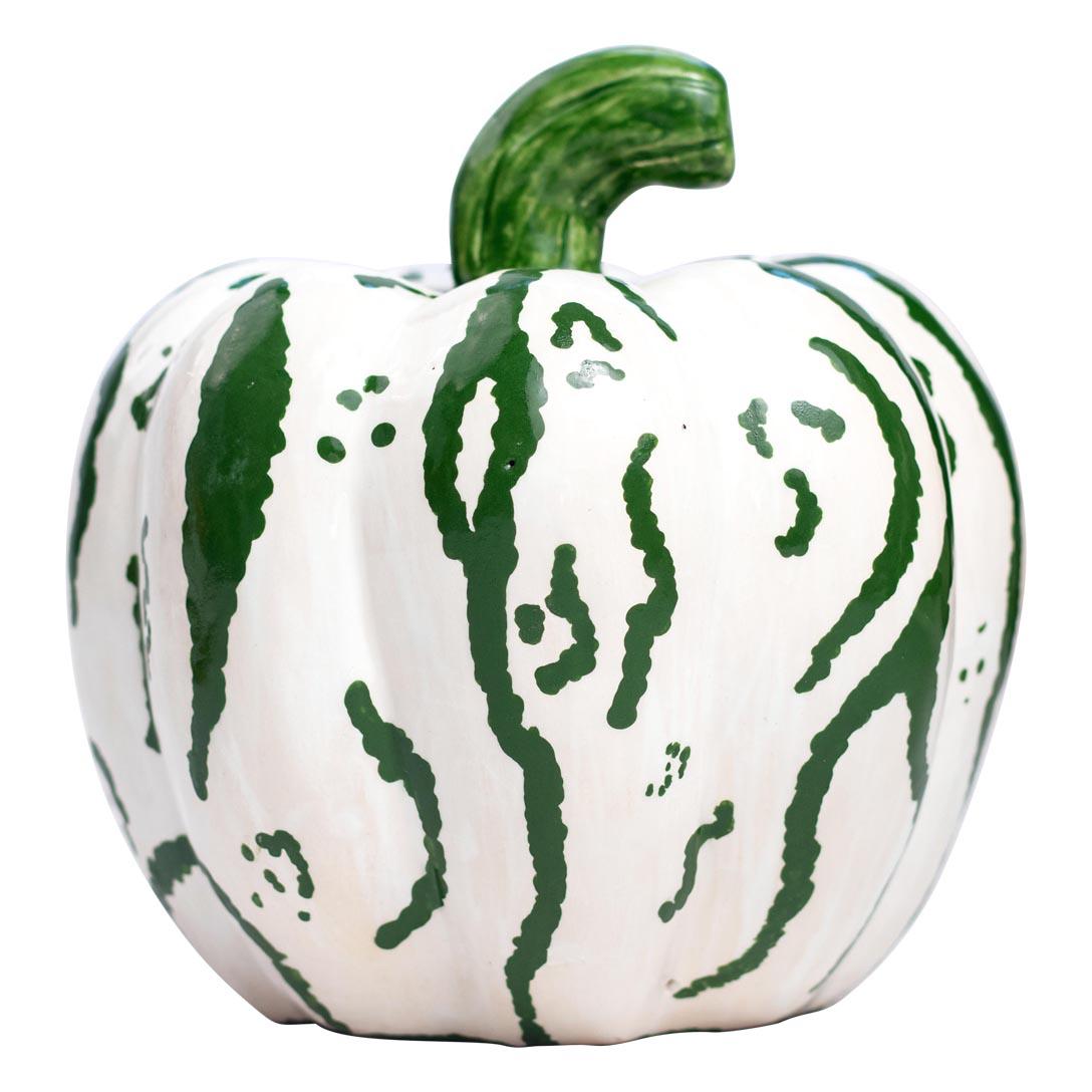 This beautiful ceramic pumpkin is a creation of Love Art Ceramics, a talented small group of artists based in South Africa. Made in 2024, this autumn harvest sculpture features stunning colors of white and green, complemented by a glossy glaze