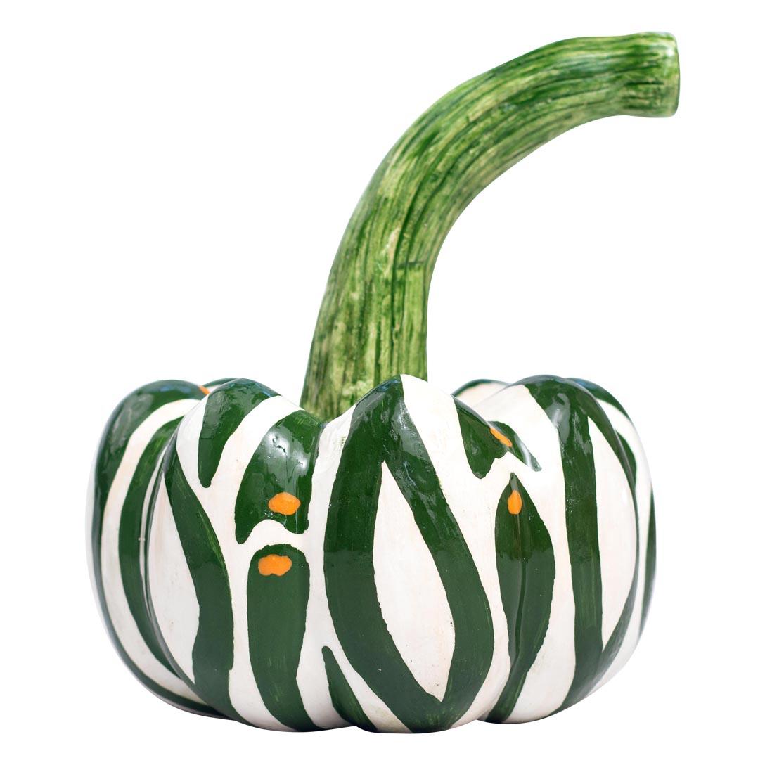 This lovely ceramic pumpkin from Love Art Ceramics is a delightful addition to any home or office decor. Crafted by a talented group of artists in South Africa, this unique piece is entirely handmade and painted, ensuring that no two pumpkins are