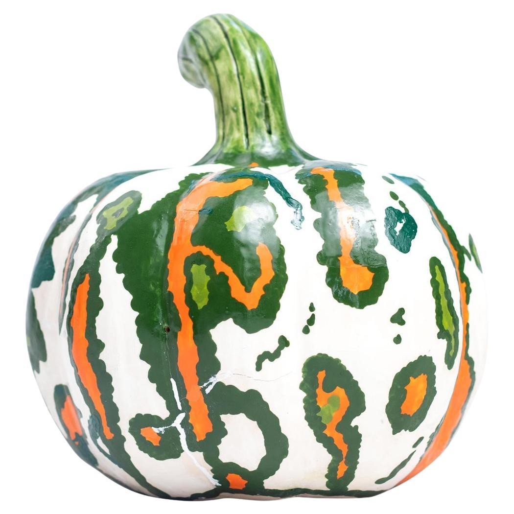 This handmade ceramic pumpkin from Love Art Ceramics in South Africa is a stunning piece created by a talented group of artists. Each pumpkin is uniquely crafted and painted without the use of molds, ensuring that every item is one-of-a-kind. The