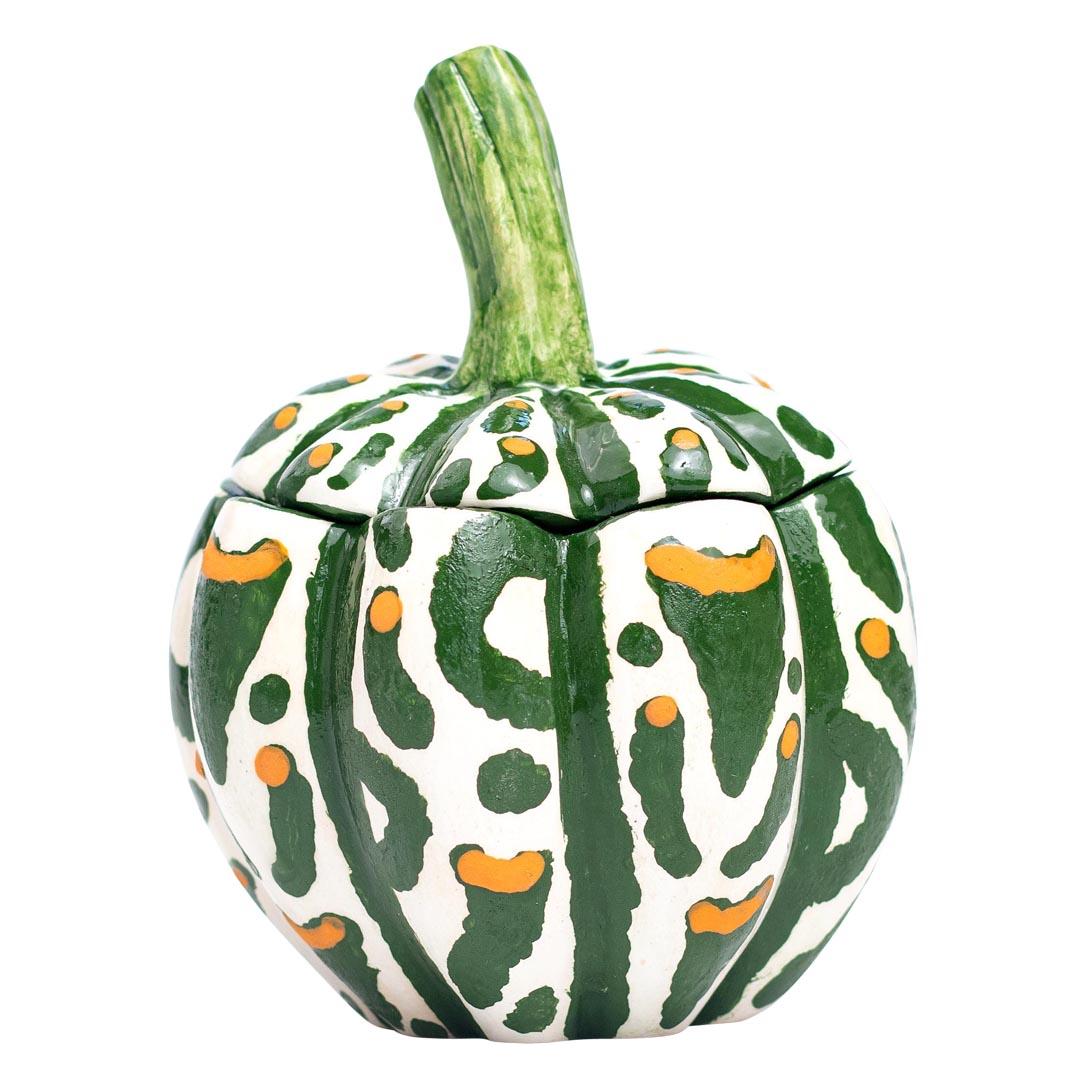 This beautiful ceramic pumpkin sculpture, crafted and painted in South Africa by Love Art Ceramics, showcases the creativity of a talented group of artists. With its vibrant colors—white, green, and orange—and a glossy finish, it stands at 4 inches