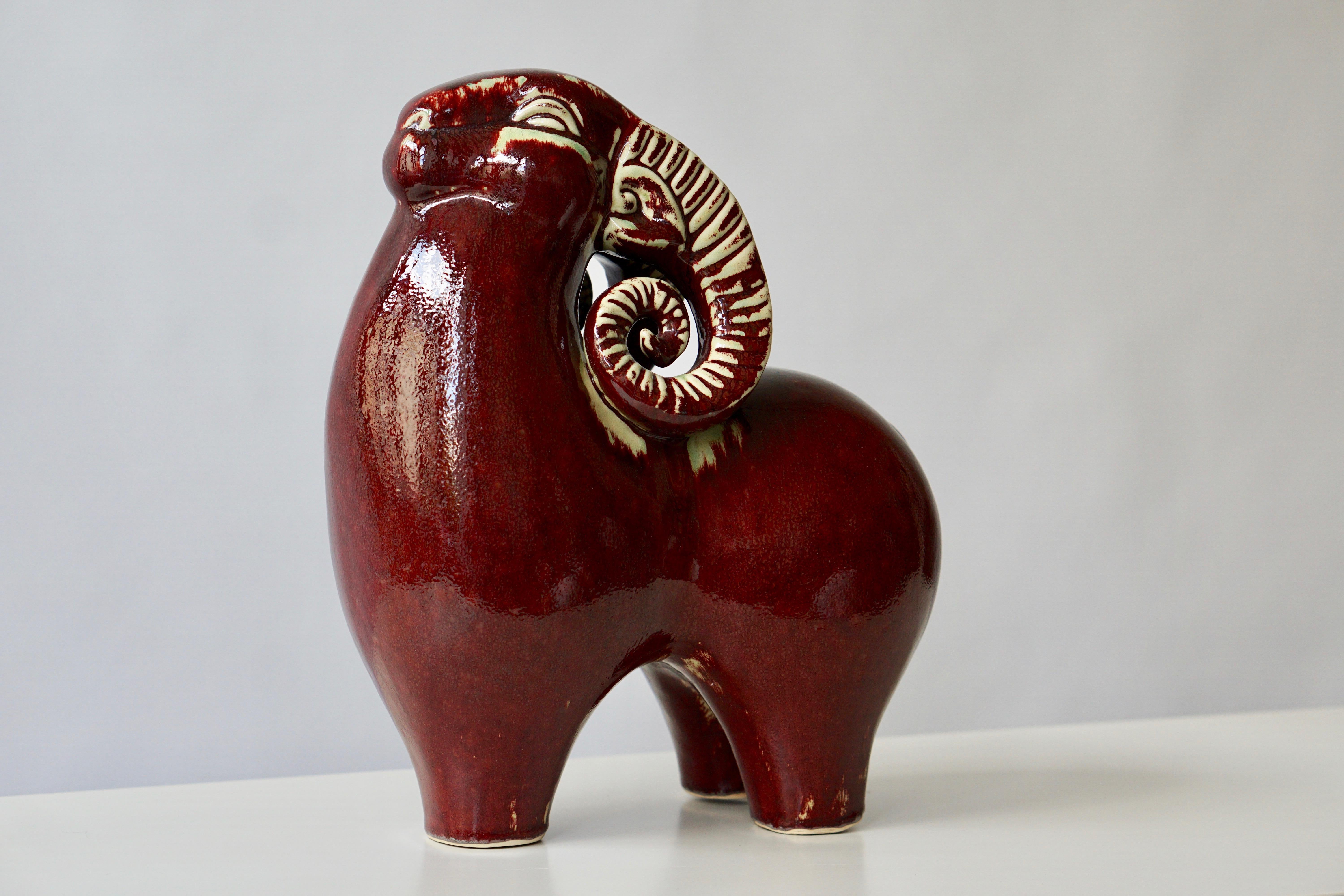 Ceramic sculpture of a ram.
Measures: Height 32 cm
Width 26 cm.
Depth 15 cm.