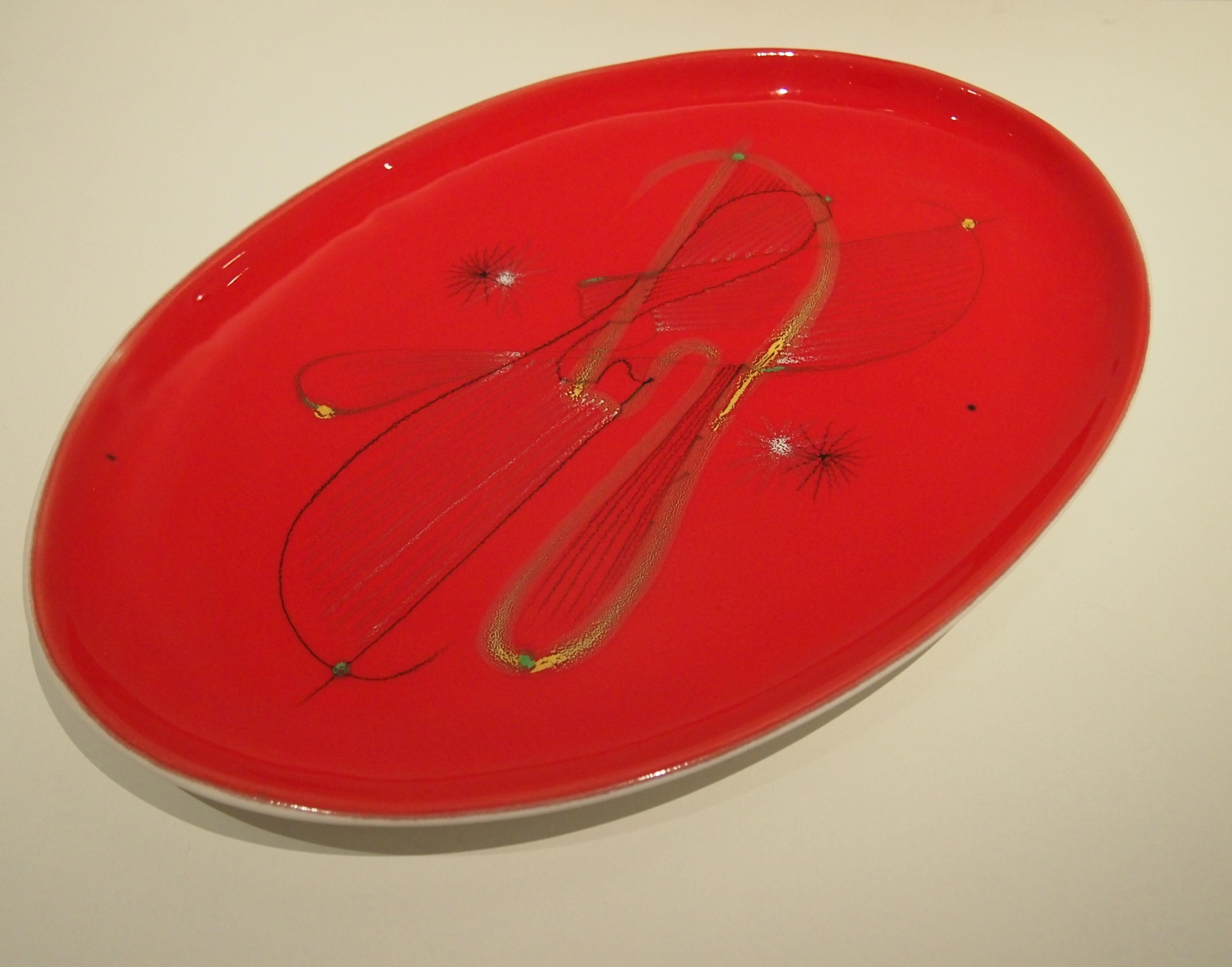 Plat émaillé rouge brillant signé du cachet d'Andre Vallauris
1950s.