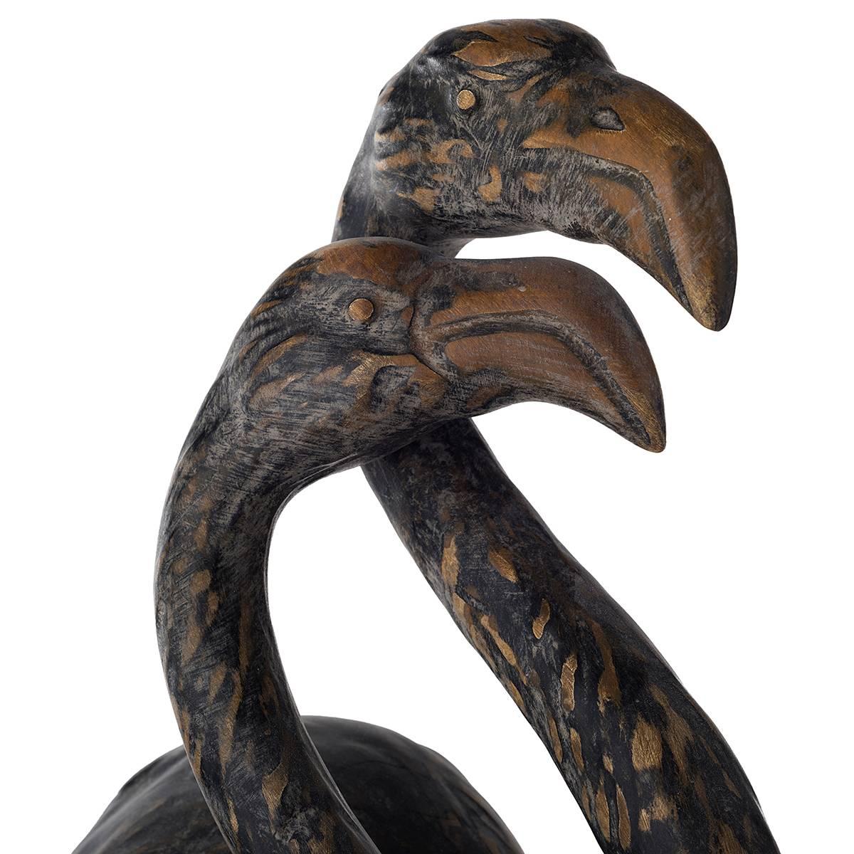 Ceramic reproduction of a flamingo couple. 
This elegant and romantic flamingo couple shows the fine detailing of this dark finished sculpture
Entirely made in ceramic and hand patinated with handsome features such as plumage and the peculiar pose,