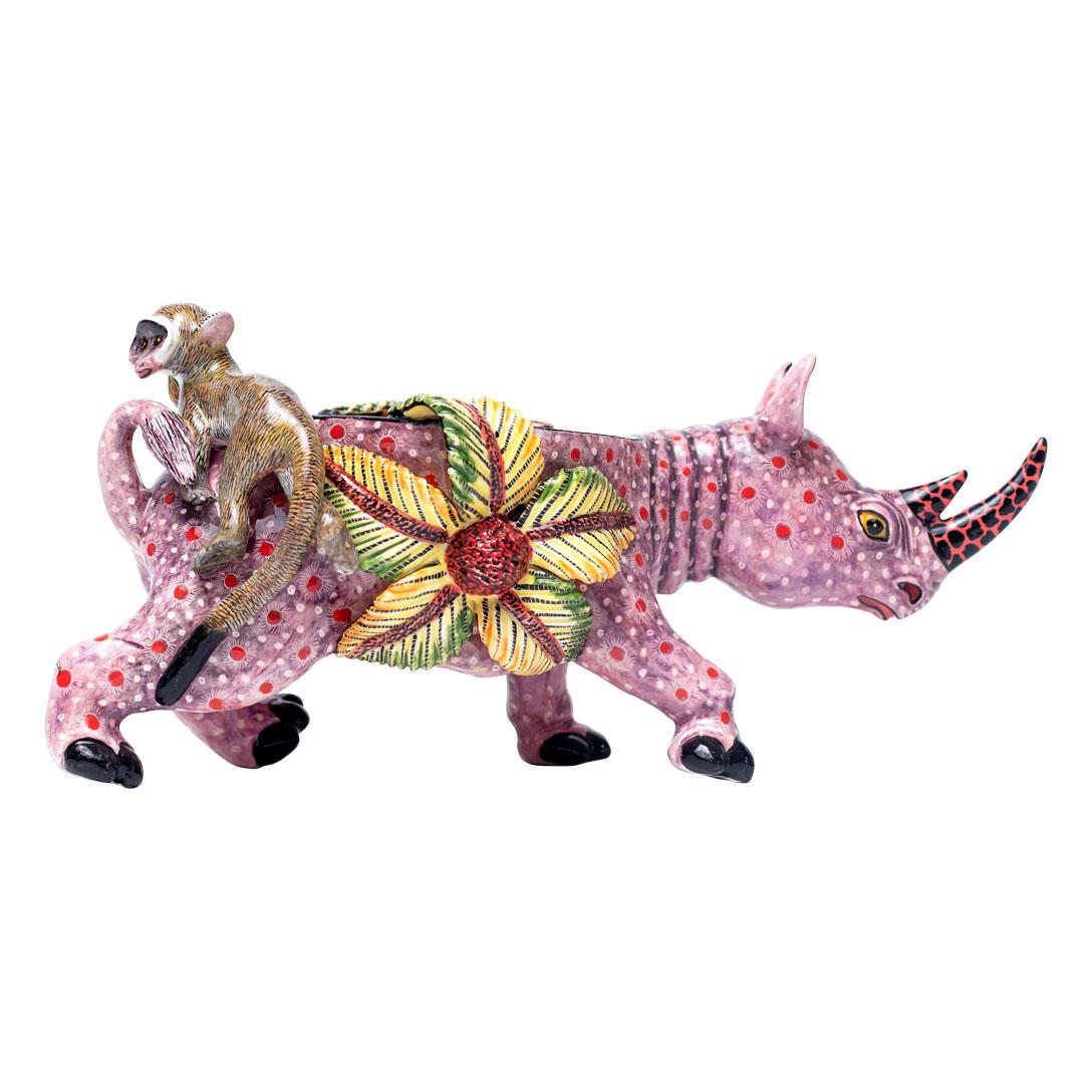 Rhino Peanut Bowl
Hand Painted by Jabu Nene, Sculpted by Motsamai Sello
Love Art Ceramic, South Africa

The Rhino Peanut Bowl is a captivating ceramic creation that pays homage to one of Africa’s most iconic animals—the rhinoceros. Measuring 4