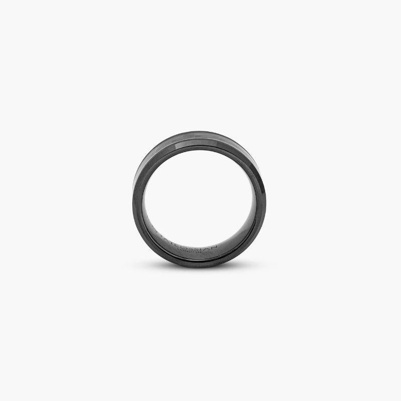Ceramic Ring with Carbon Fibre, Size L

This unique ring formed from a single ceramic piece has a satin finish and then inlaid with carbon fibre for a contemporary look. Black ceramic a hard, smooth material cut using diamonds in a technically