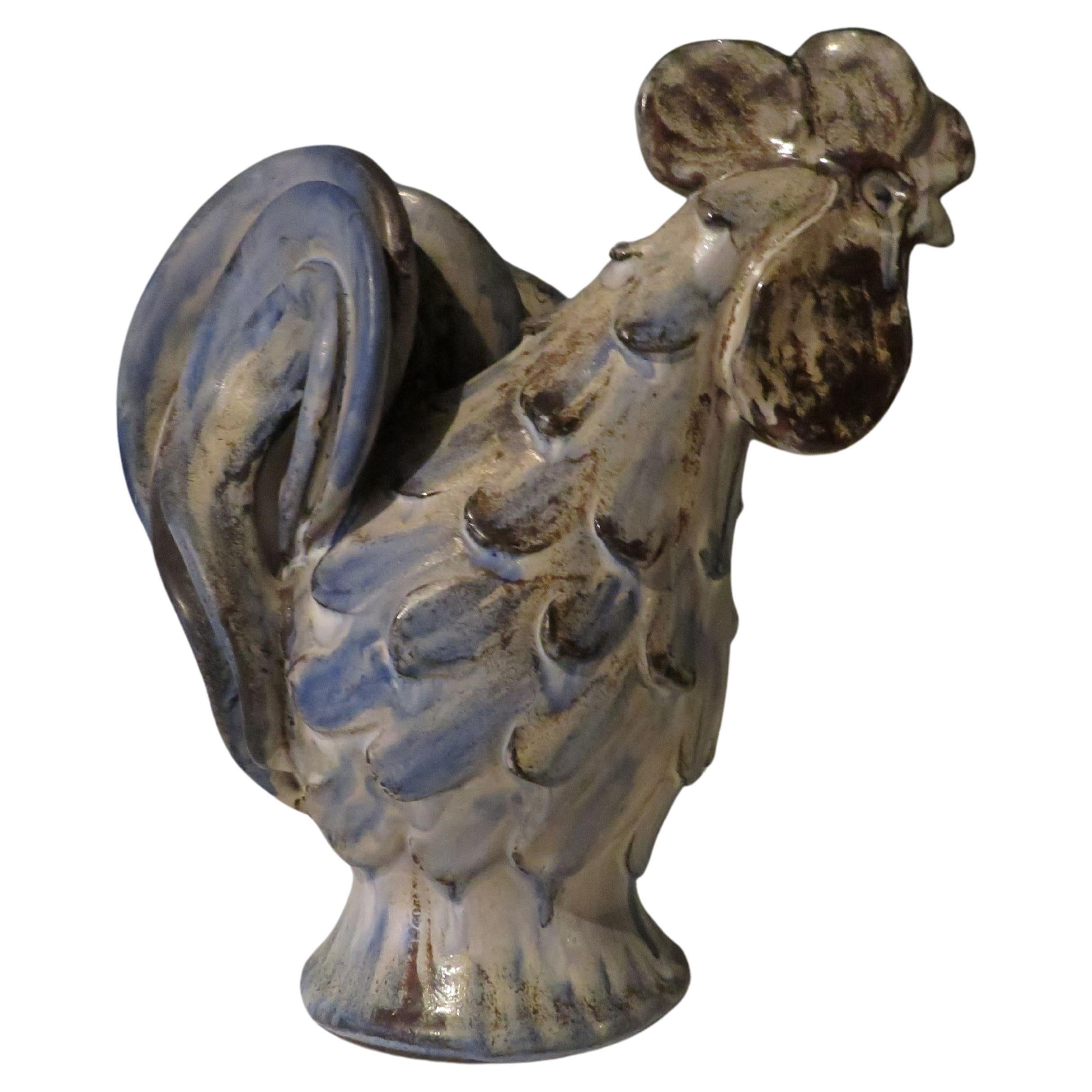 Attractive ceramic statue in ceramic with a matte glaze in blue-gray and brown tones.
The rooster was made by Viggo Kyhn for Kähler's ceramic factory in Denmark.
The statue is signed at the bottom and is in very good condition.
If there is no