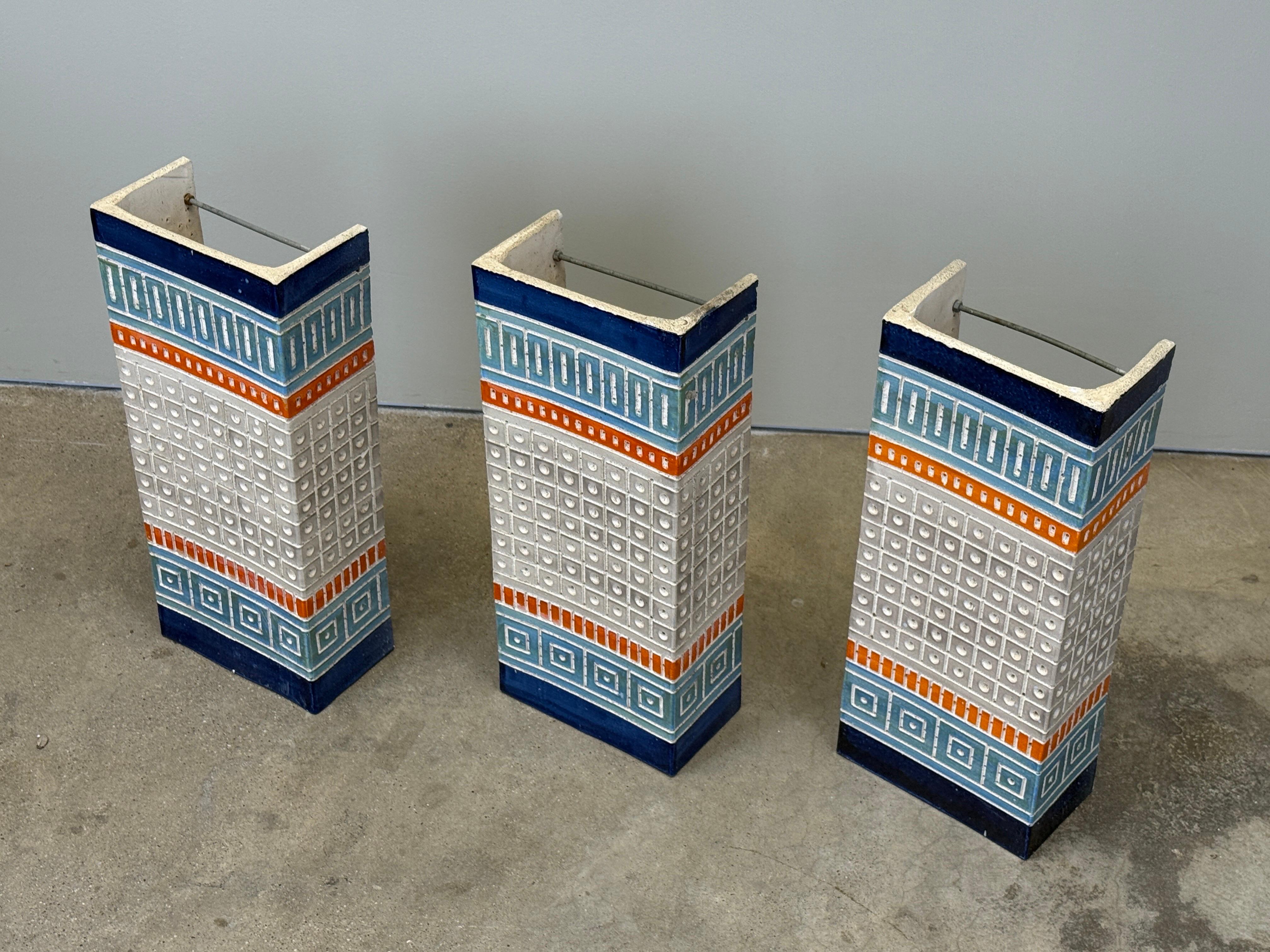 A set of three large matching ceramic sconces by Martha and Beaumont Mood. Three smaller sconces available in separate listing. Priced and sold individually. 