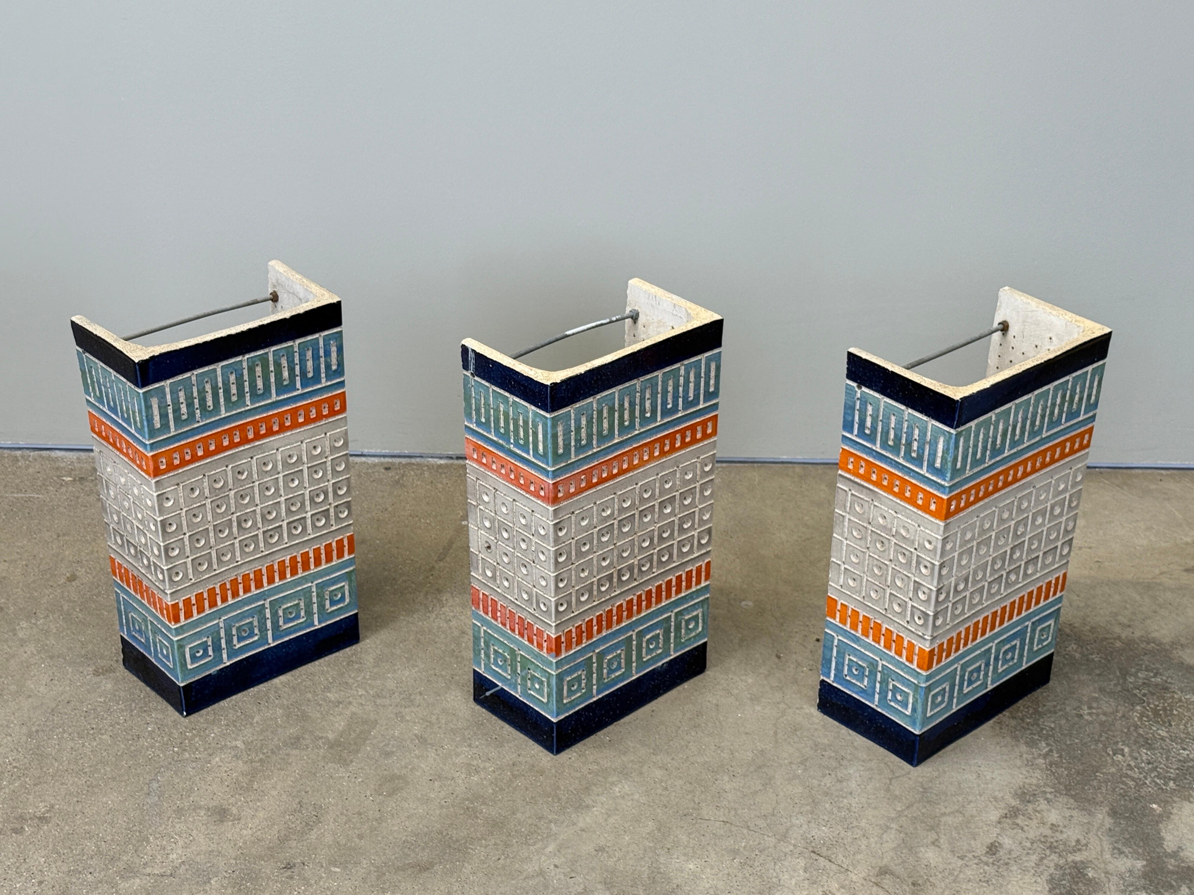 A set of three large matching ceramic sconces by Martha and Beaumont Mood. Three larger sconces available in separate listing. Priced and sold individually.