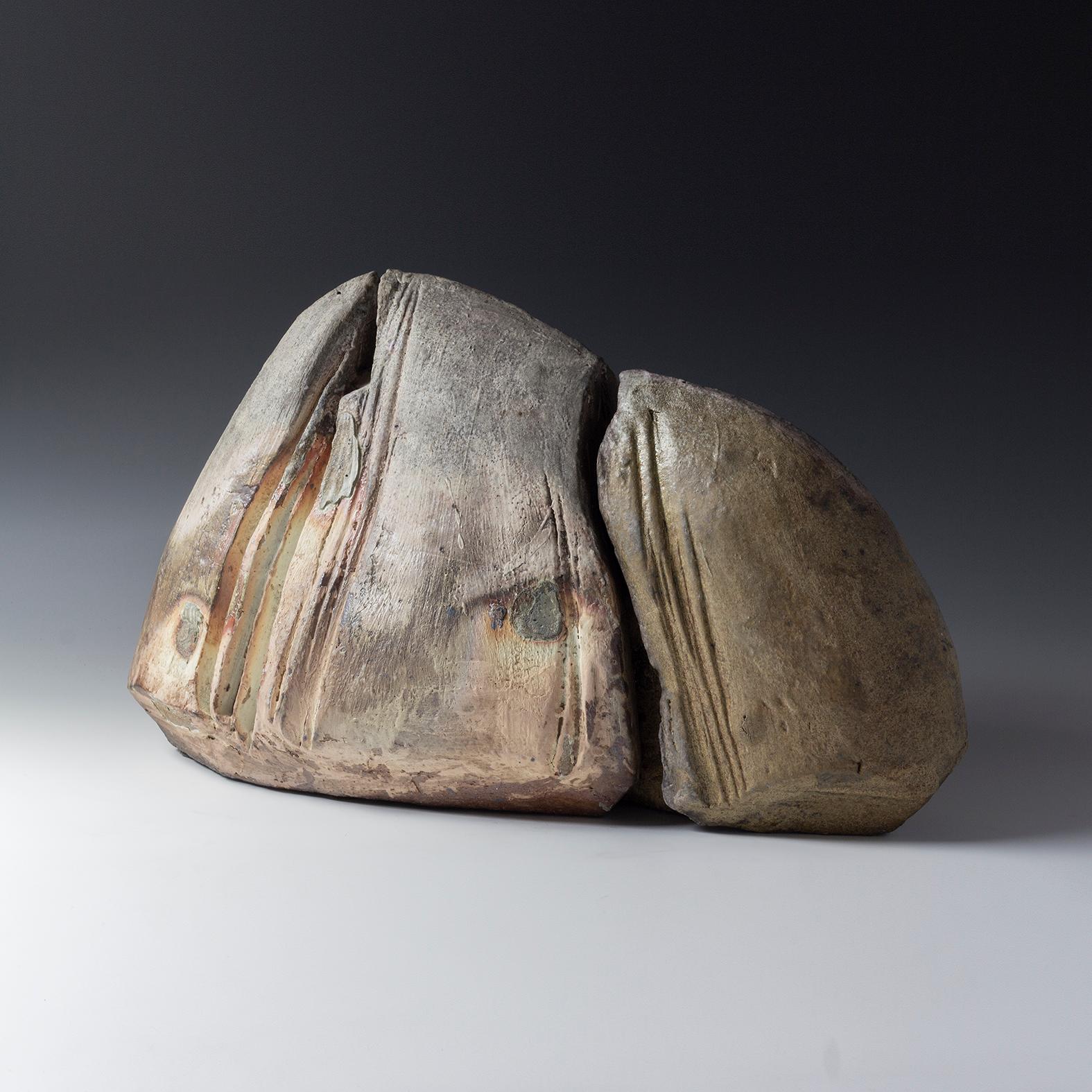 Eric Astoul is a renowned French artist established in La Borne, France. His wood-fired stoneware sculptures are rich in this tension between interior and exterior, an internal surge which seems to be able to shatter the work, its erected walls,