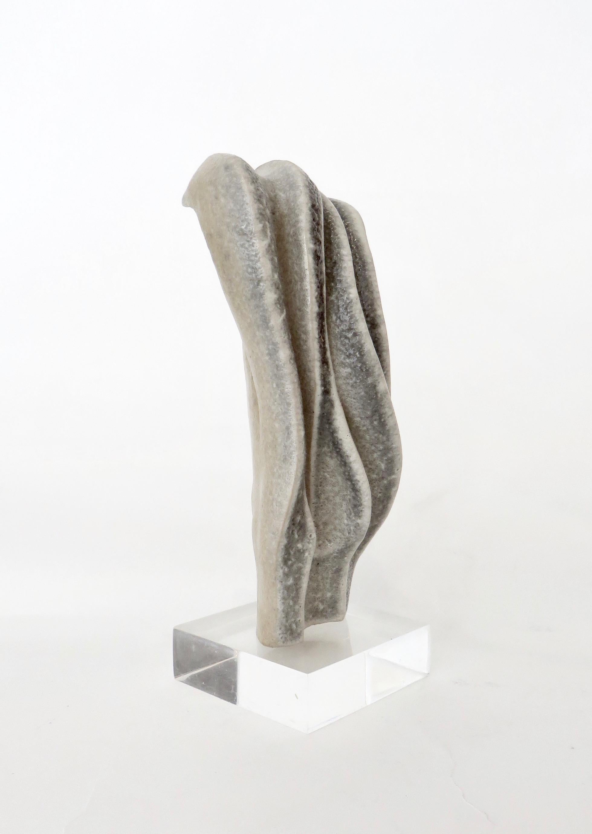 Small organic TOTEM ceramic sculpture by Italian artist Carlo Zauli.
Like other masters of previous generations, from Martini to Fontana and Leoncillo, his technical training was in the field of ceramic art. Zauli moved away from its formal