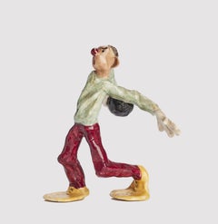 Ceramic sculpture depicting a man throwing a bowling ball, USA, 1950 ca.