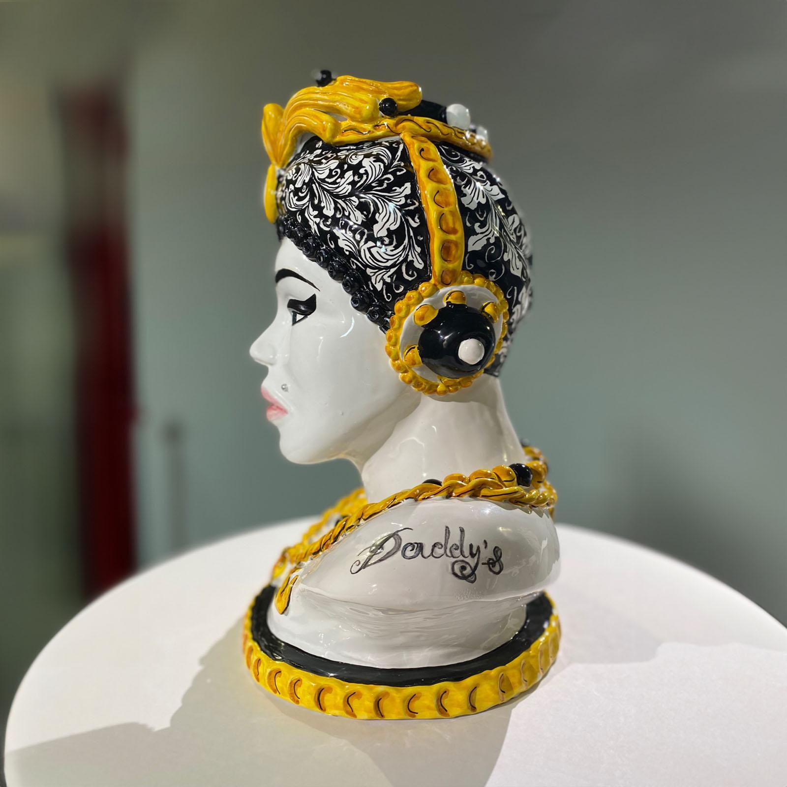 The “Surolù” art works - this is artistic identity chosen by Vanessa Semaino - arise from the artist 's need to represent women’s condition today, particularly in their emotional states that confer their unique identities. These precious ceramic