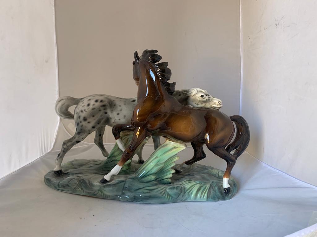 Ceramic sculpture of 2 horses by Ronzan, 1940s.
Packaging with bubble wrap and cardboard boxes is included. If the wooden packaging is needed (fumigated crates or boxes) for US and International Shipping, it's required a separate cost (will be