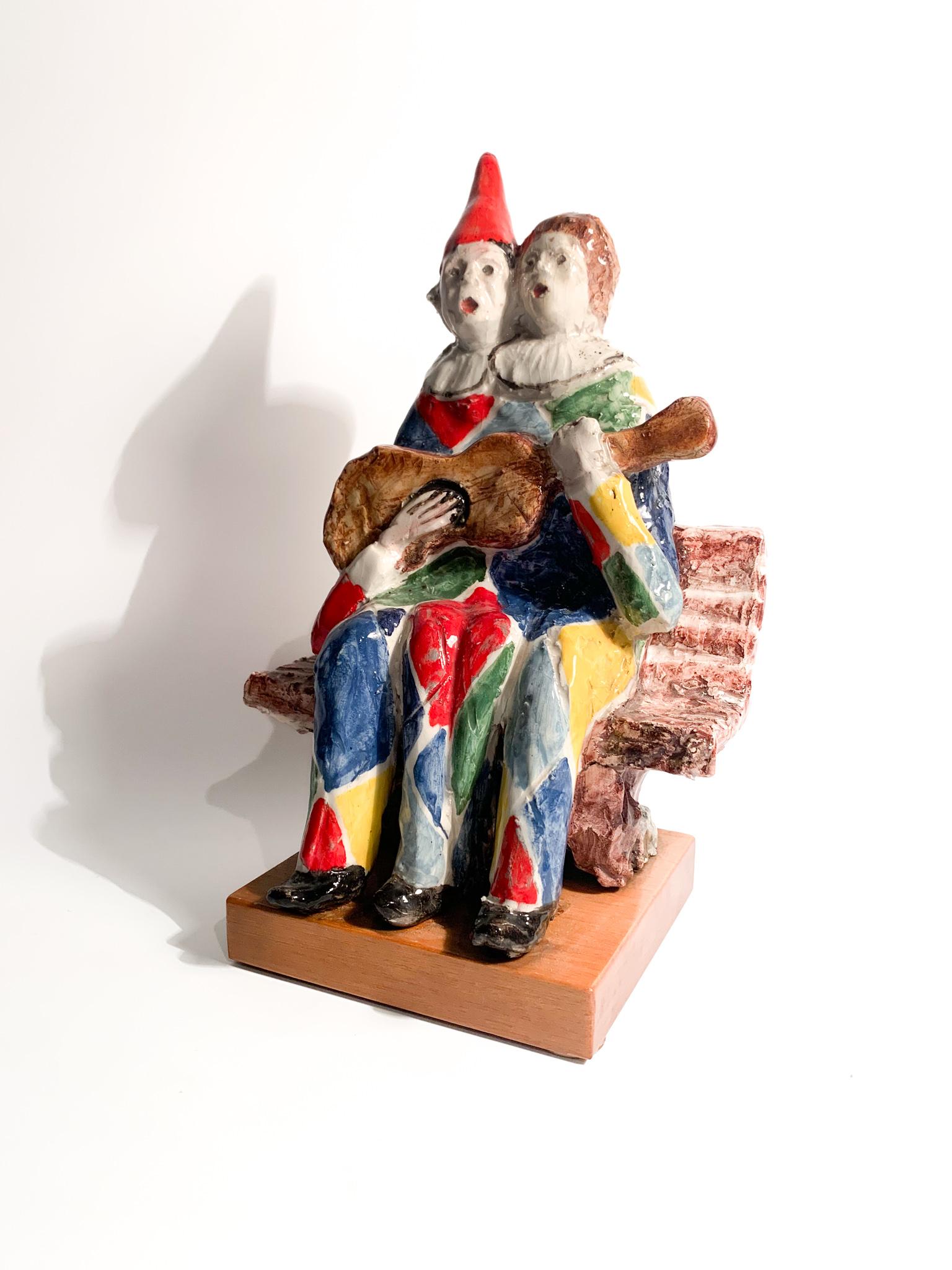 Ceramic figurine depicting a couple of musicians, created by Walter Pozzi in the 1980s

Ø 17 cm Ø 13 cm h 30 cm