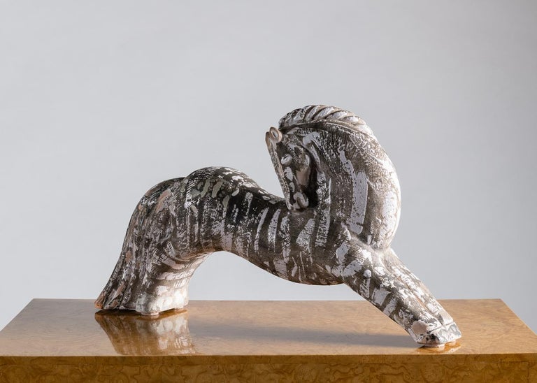 An elegant ceramic sculpture of a zebra from the famed French line Primavera.

Stamped: PRIMAVERA
Incised: Made in France.