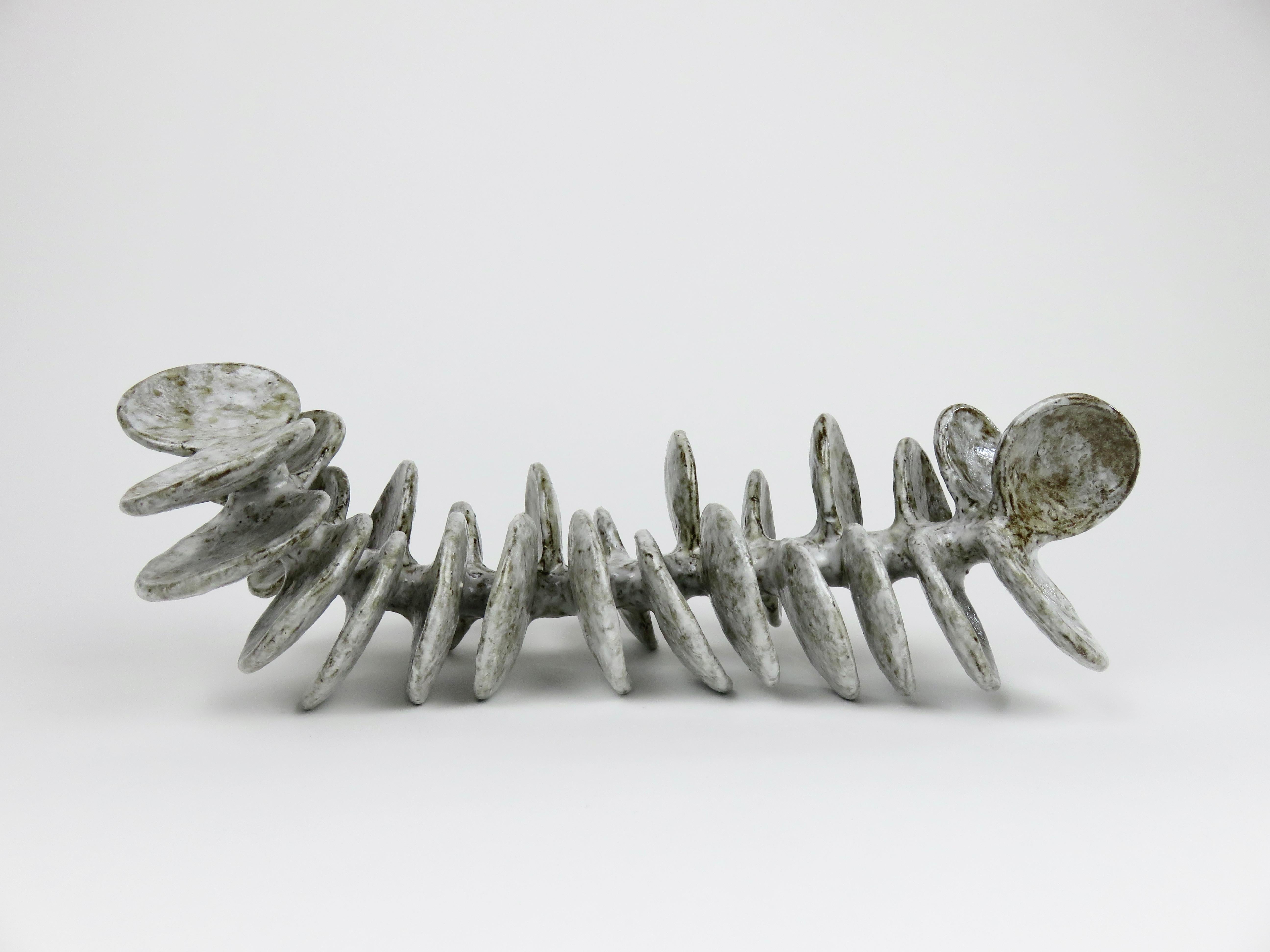 Ceramic Sculpture, Reclining Skeletal Spine in Mottled White and Brown For Sale 4
