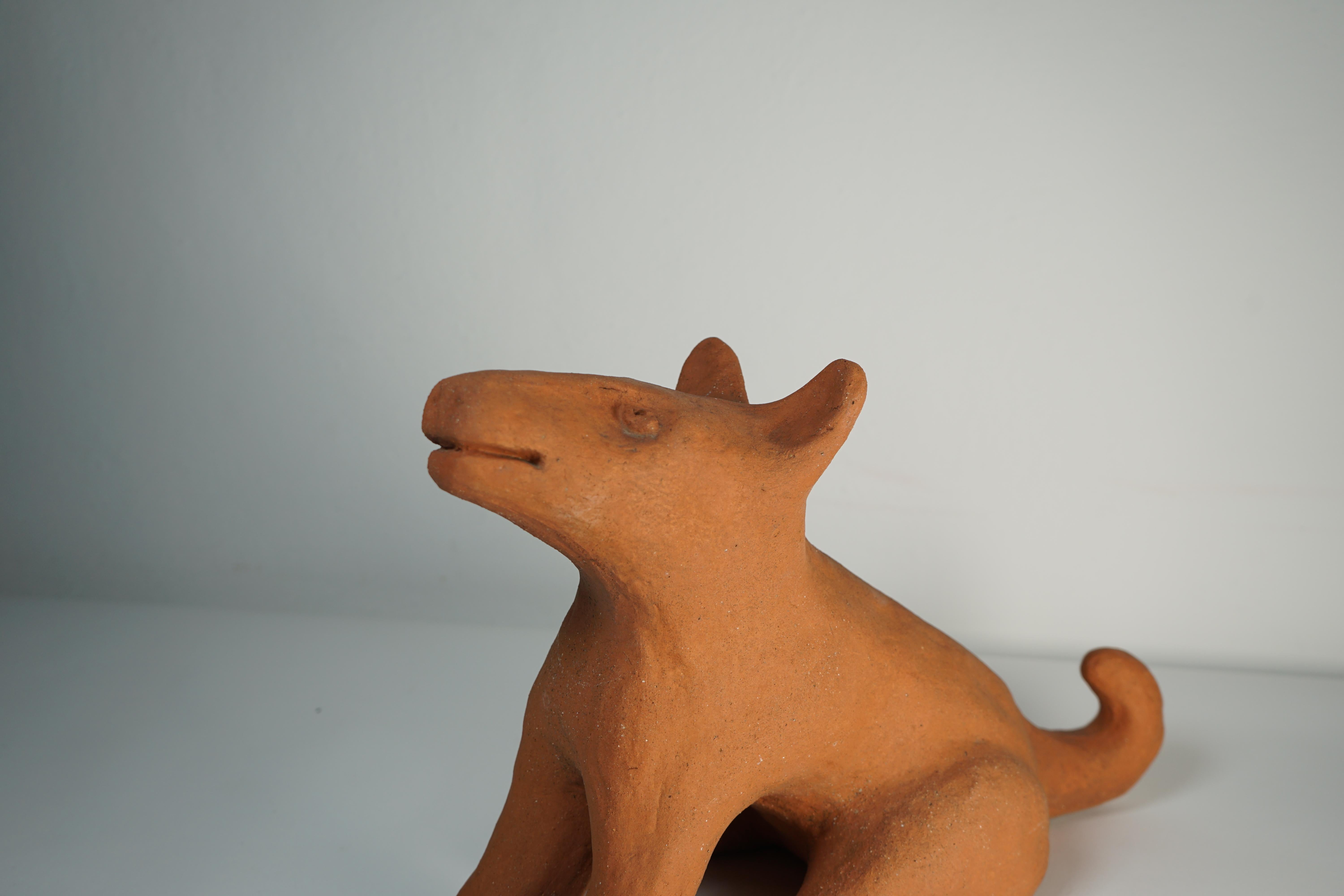 Ceramic sculpture Wolf model designed by Nathalie Du Pasquier and produced by Alessio Sarri in 1993. Engraved in the pottery, signature of the artist and manufacturer .
The fox is part of a series of sculptures made up of 7 different