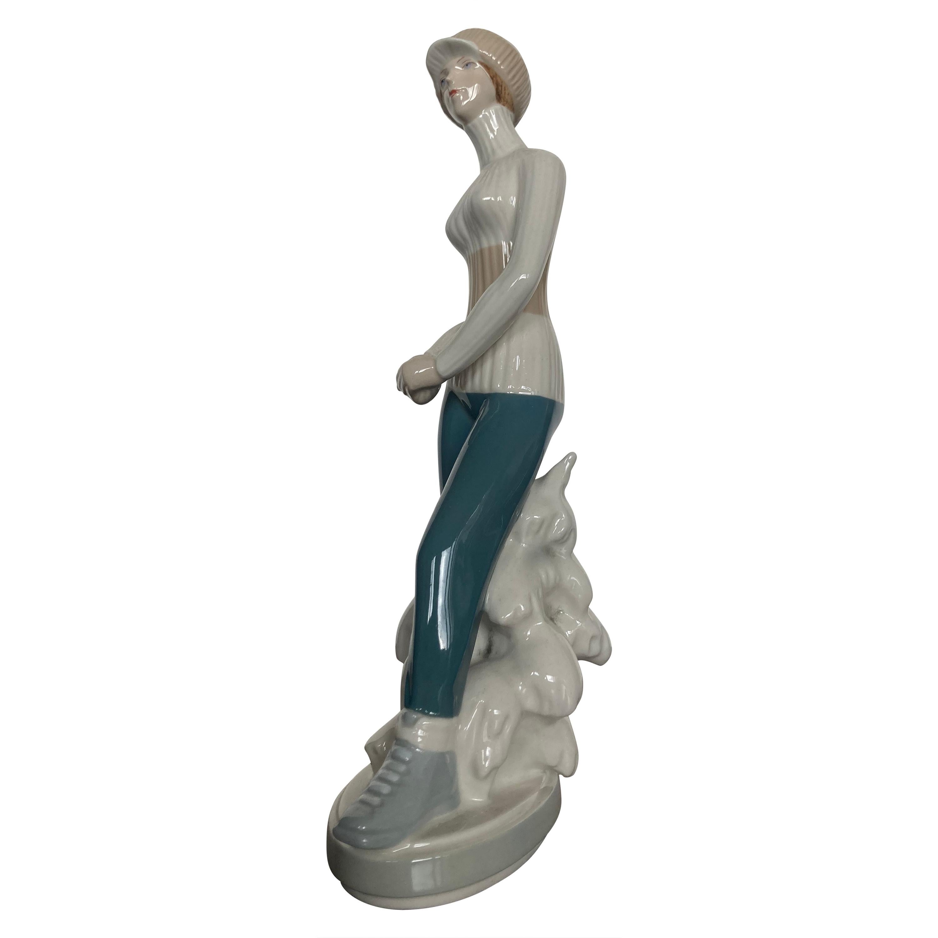 Ceramic Sculpture "Woman in winter" by Royal Dux, 1960s/Czechoslovakia For Sale