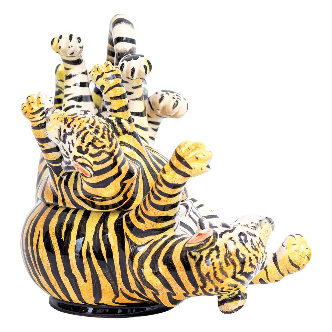 Tiger Jewelry Box: Hand-Painted by Zinhle Nene and Sculpted by Sbusiso & Motsamay

The Tiger Jewelry Box is a stunning piece of ceramic art crafted by Love Art Ceramic in South Africa, designed in 2023. Measuring 6 inches high, 5 inches long, and 8