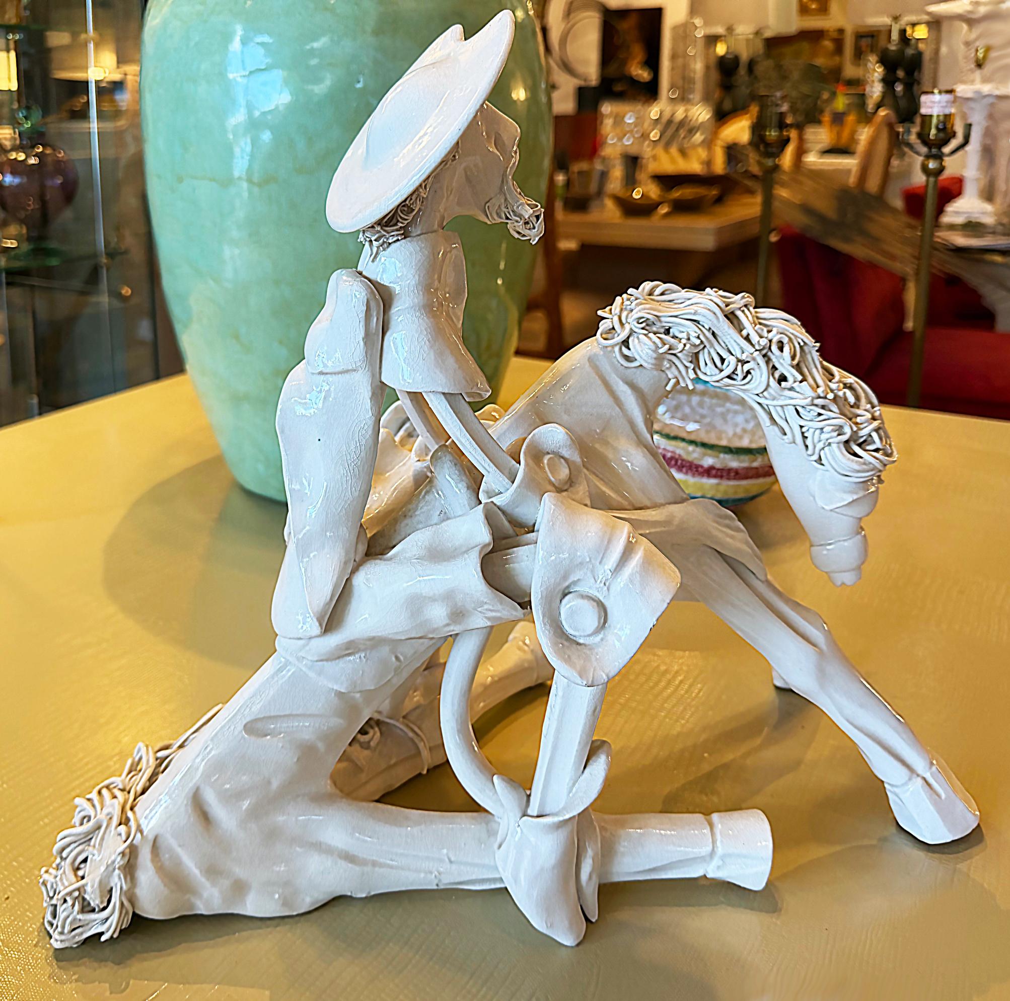 Ceramic Spaghetti Don Quixote Sculpture by Roberto Nischili 
Offered for sale is a large sized ceramic spaghetti Don Quixote sculpture that includes his horse named Rocinante. The spaghetti textures are particularly interesting with the horse's mane