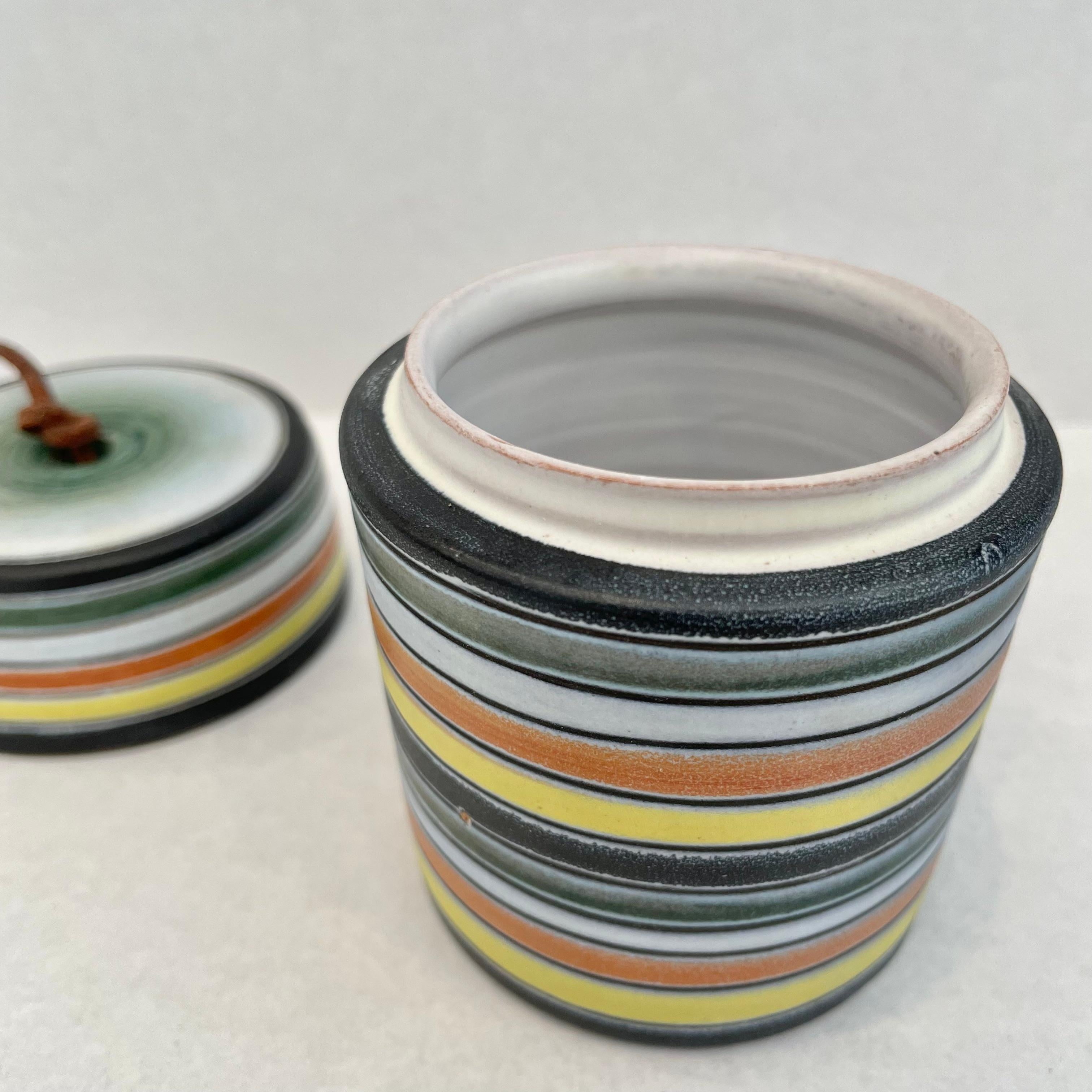 Fantastic hand painted ceramic stash jar by Raymor. Underside reads 