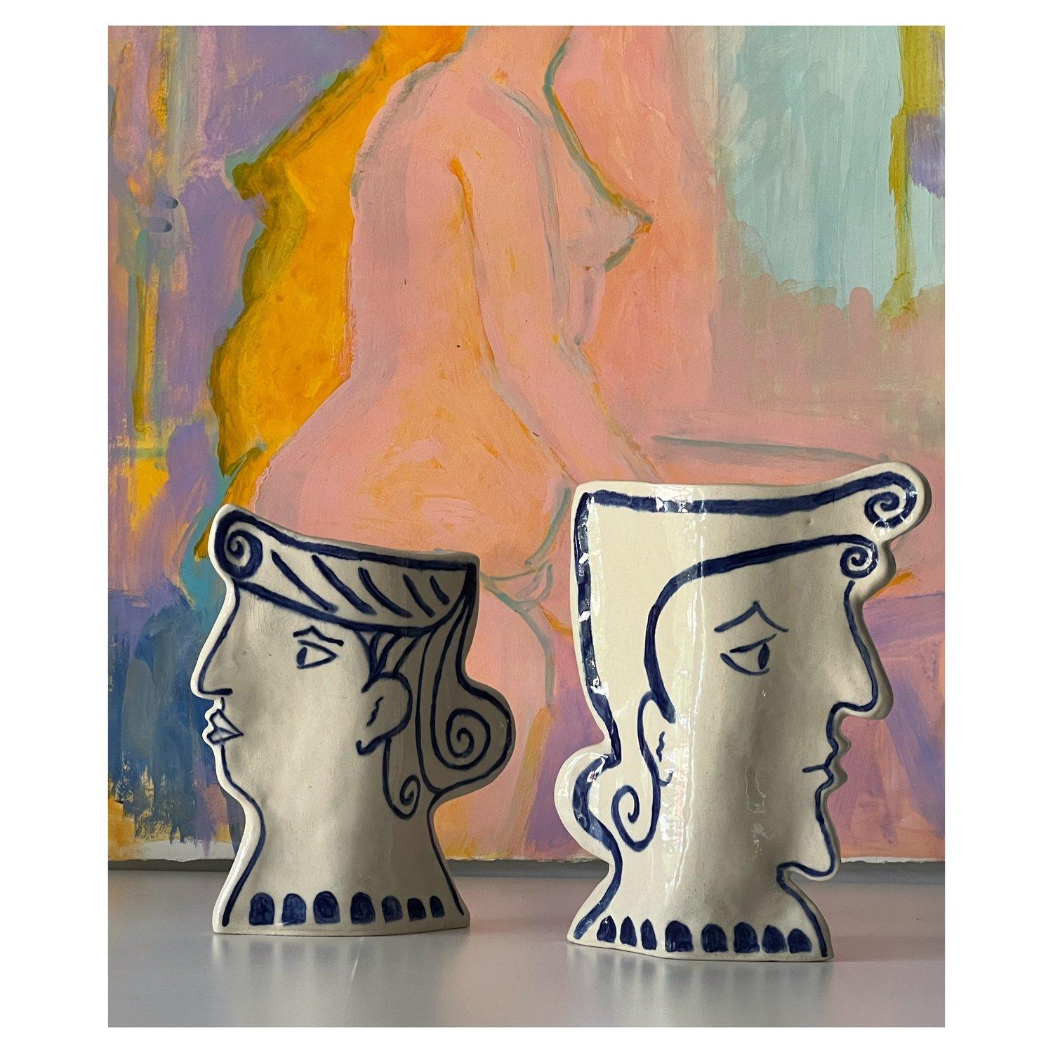 A mix of the old world with abstract influences. Drawing from classical Greek style and cubism. Stoneware, underglaze painted on leather hard clay and clear glaze high fired to cone six. Made by artist Susanne Portanova of North Carolina. An