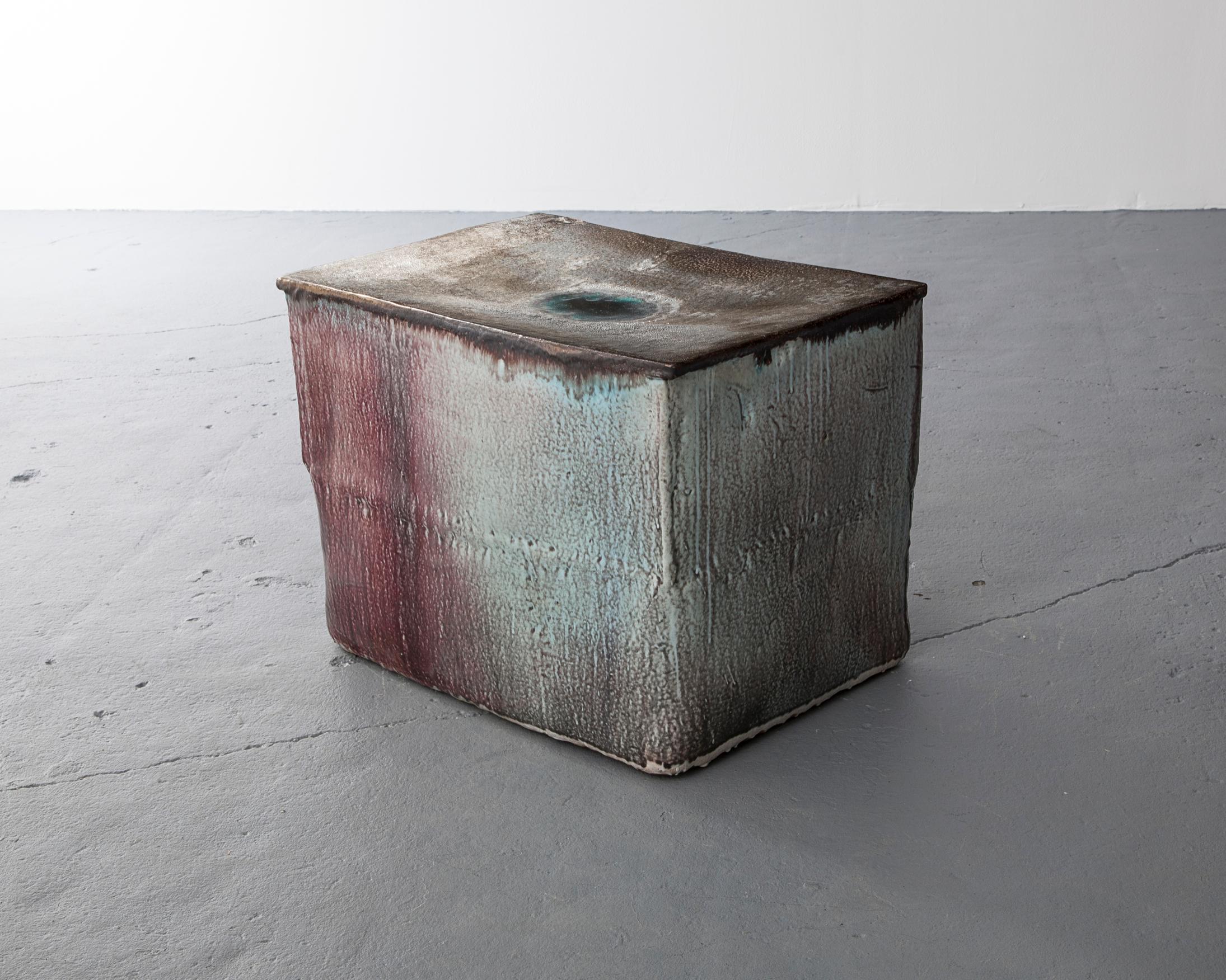 Ceramic stool in purple glaze with metal effect top. Designed and made by Hun-Chung Lee, Korea, 2010.
 